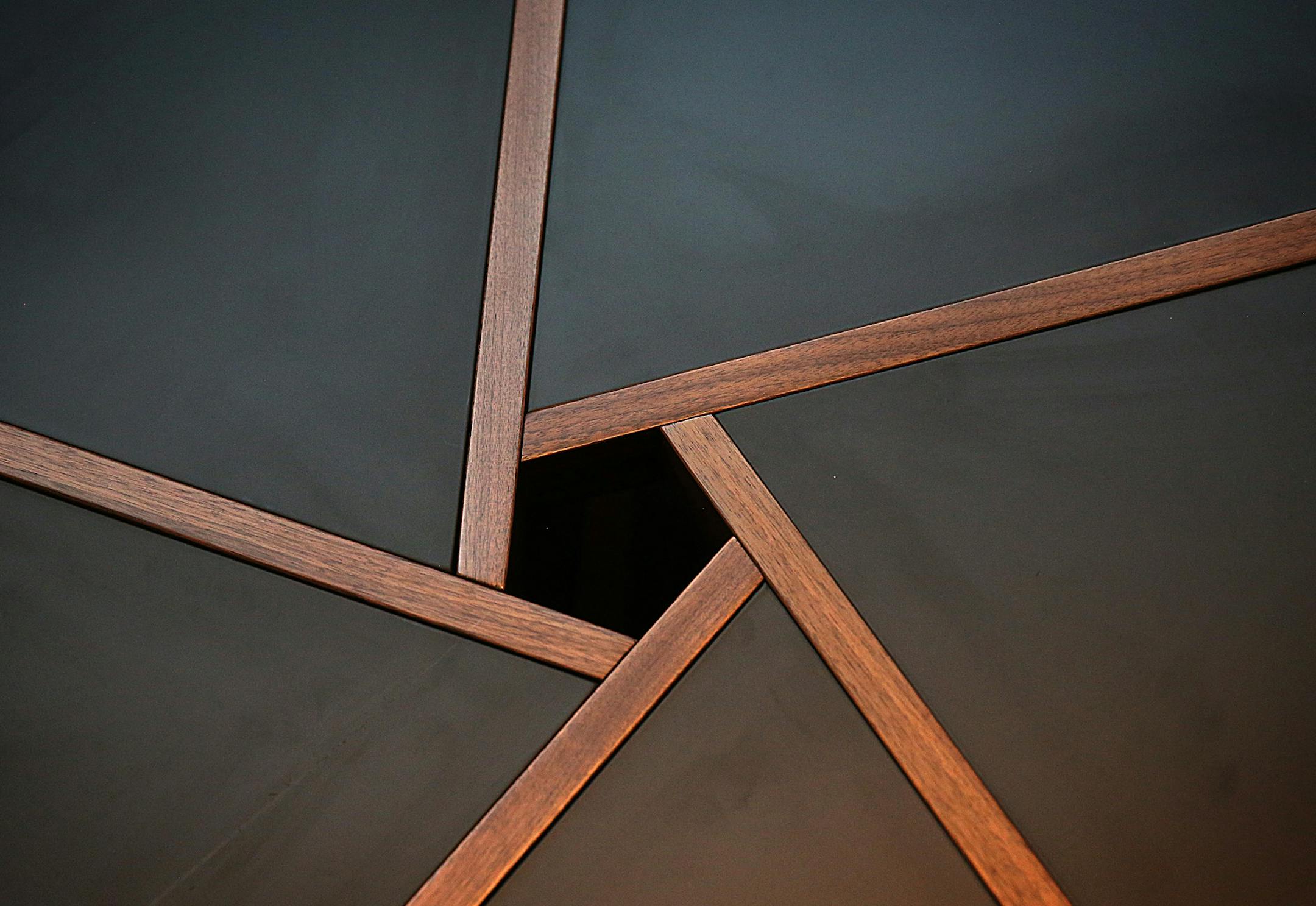 A geometric pattern is a prominent feature of a Pi Coffee Table available at the Blu Dot outlet store in Minneapolis. ] JIM GEHRZ ï james.gehrz@startribune.com / Minneapolis, MN / July 16, 2015 / 11:00 AM ñ BACKGROUND INFORMATION: Local modern furniture manufacturer Blu Dot opens its first outlet store. The Minneapolis store will feature discounted items as well