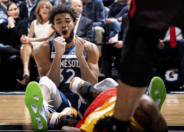 Minnesota Timberwolves' Karl-Anthony Towns reacted after being called for a foul in the fourth quarter.