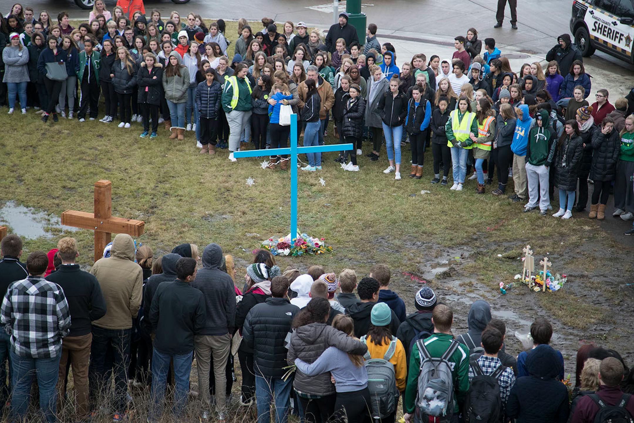 Students from Mounds View High school gathered at the crash scene along Hwy. 96 where they left memorials for two students who were killed in a crash December 05, 2016.