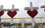 Crosses showing shooting victims names stand near the First Baptist Church Thursday, Nov. 9, 2017, in Sutherland Springs, Texas. A man opened fire ins