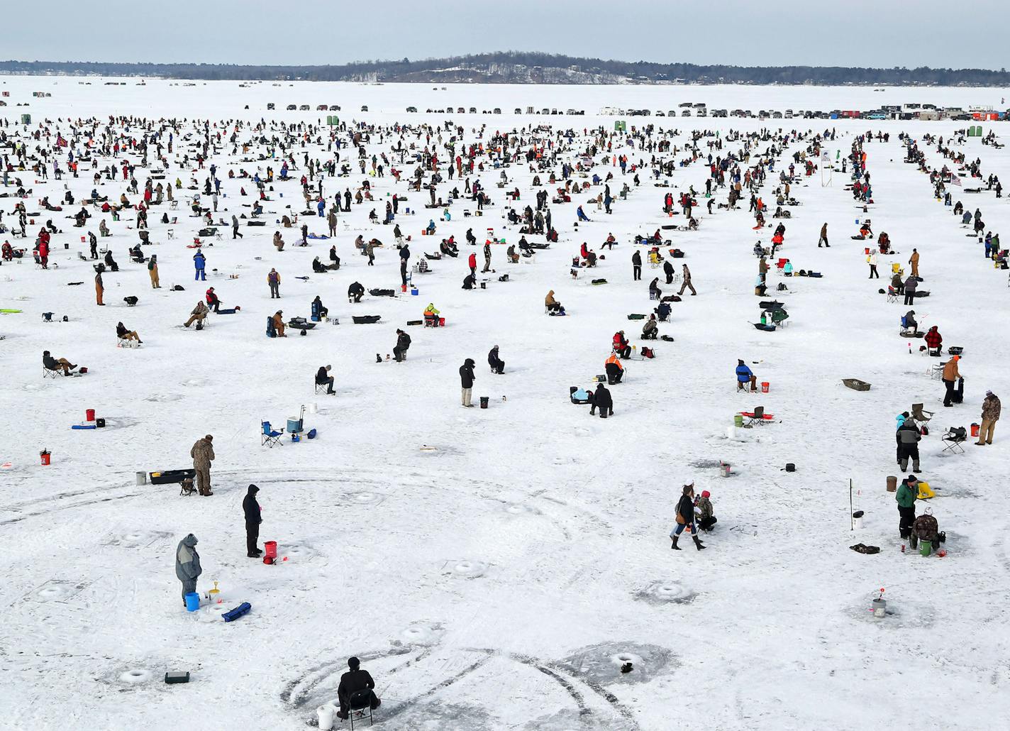 Some of the 10,000 ice fishing contestants on Hole in the Day Bay of Gull Lake during the Ice Fishing Extravaganza Saturday, Feb. 6, 2016, in Brainerd, MN.](DAVID JOLES/STARTRIBUNE)djoles@startribune.com About 10,000 ice fishing contestants were expected to headed to Gull Lake north of Brainerd for the Brainerd Jaycees 26th Annual $150,000 Ice Fishing Extravaganza.