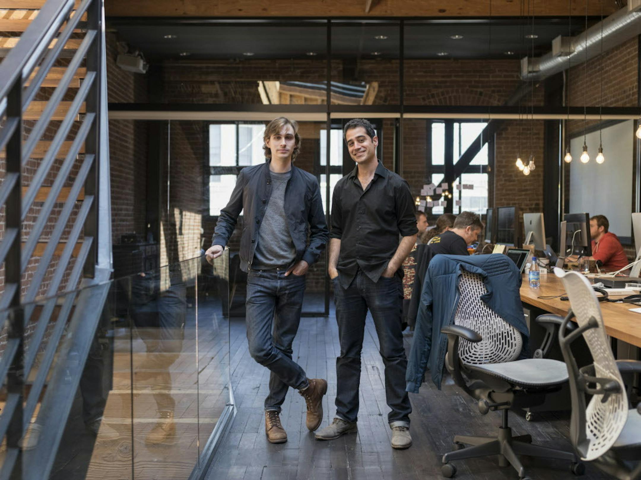 Kayvon Beykpour, chief executive and co-founder of Periscope, right, and Joe Bernstein, a co-founder, at their office in San Francisco, March 25, 2015. Periscope, a live-streaming video app that Twitter introduced on Thursday, is one among a surge of such apps with names like Meerkat and Camio that are taking the social media world by storm. (Jason Henry/The New York Times)
