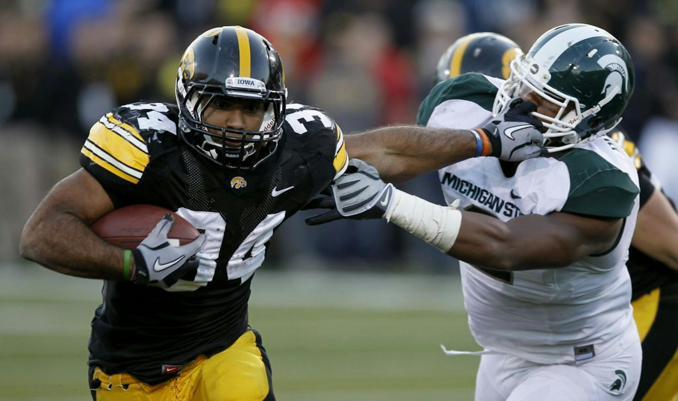 Michigan State linebacker William Gholston (right)