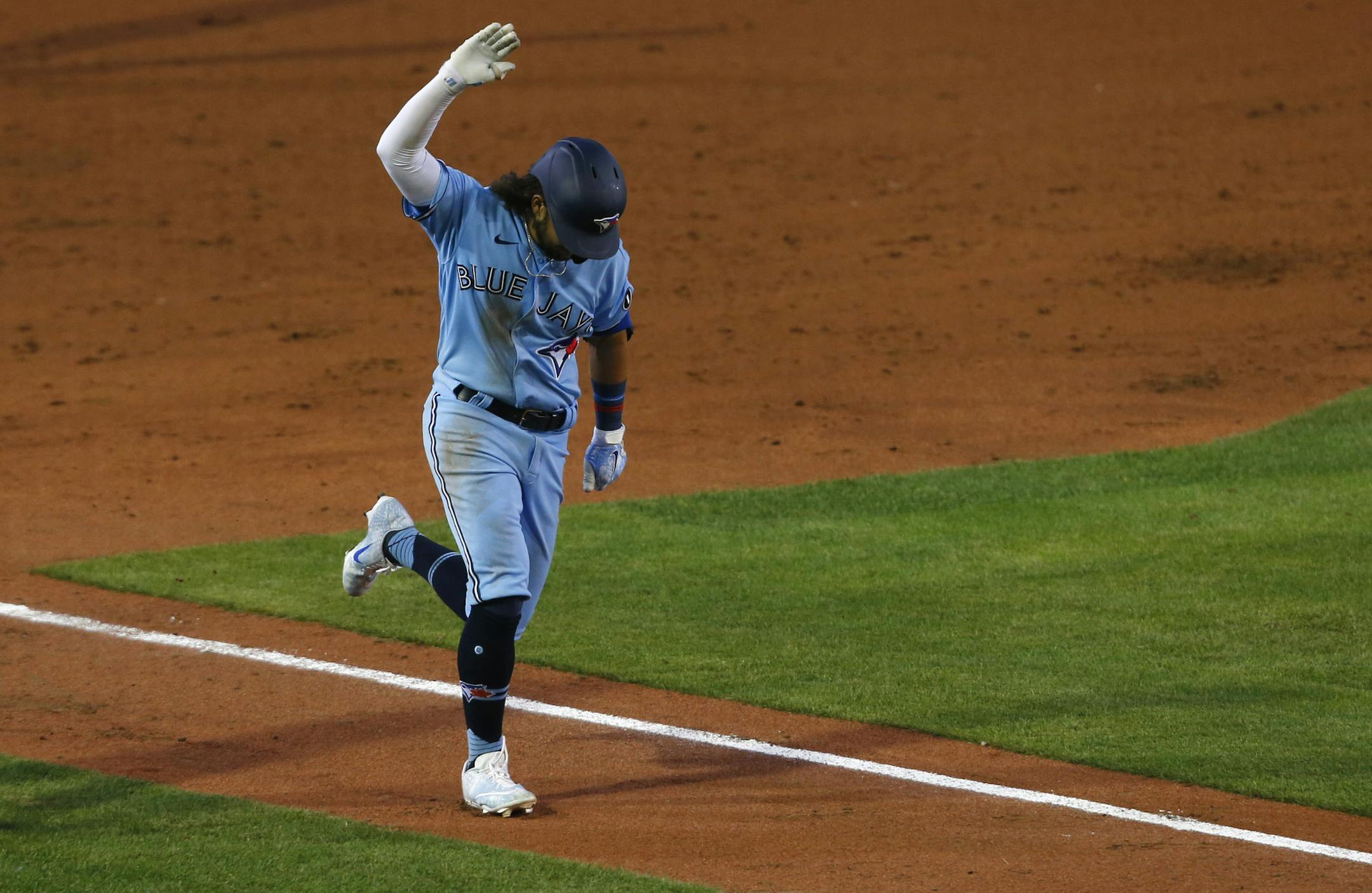 Toronto Blue Jays Bo Bichette celebrates his three-run homer against the Miami Marlins during the sixth inning of a baseball game, Tuesday, Aug. 11, 2020, in Buffalo, N.Y. (AP Photo/Jeffrey T. Barnes)