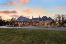 This French chateau, set on 4 acres in Orono, is now on the market for $4.295 million.