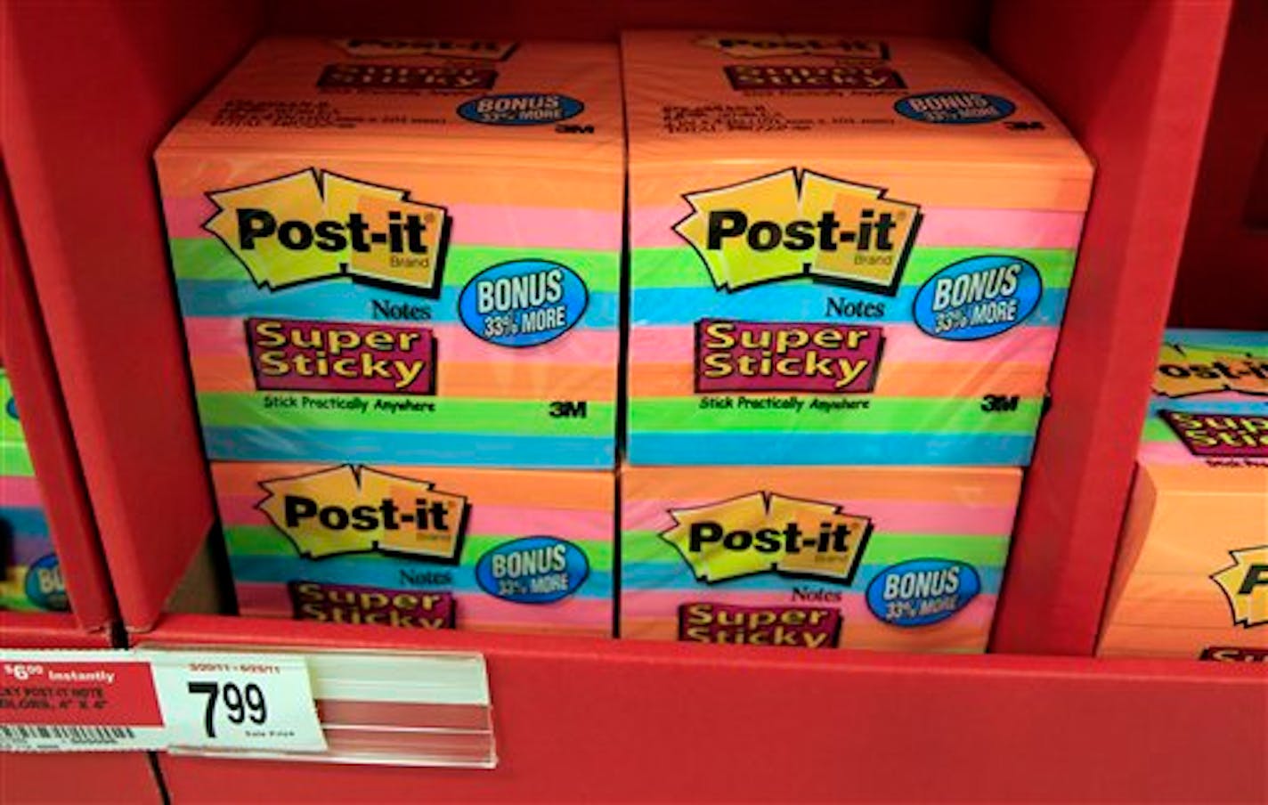 In this Monday, April 25, 2011, photo, 3M's Post-it notes are on sale at Office Depot in Mountain View, Calif. Post-it notes and other office products helped lift 3M's fourth-quarter profit in 2012, despite a slowdown in other parts of its business. (AP Photo/Paul Sakuma)