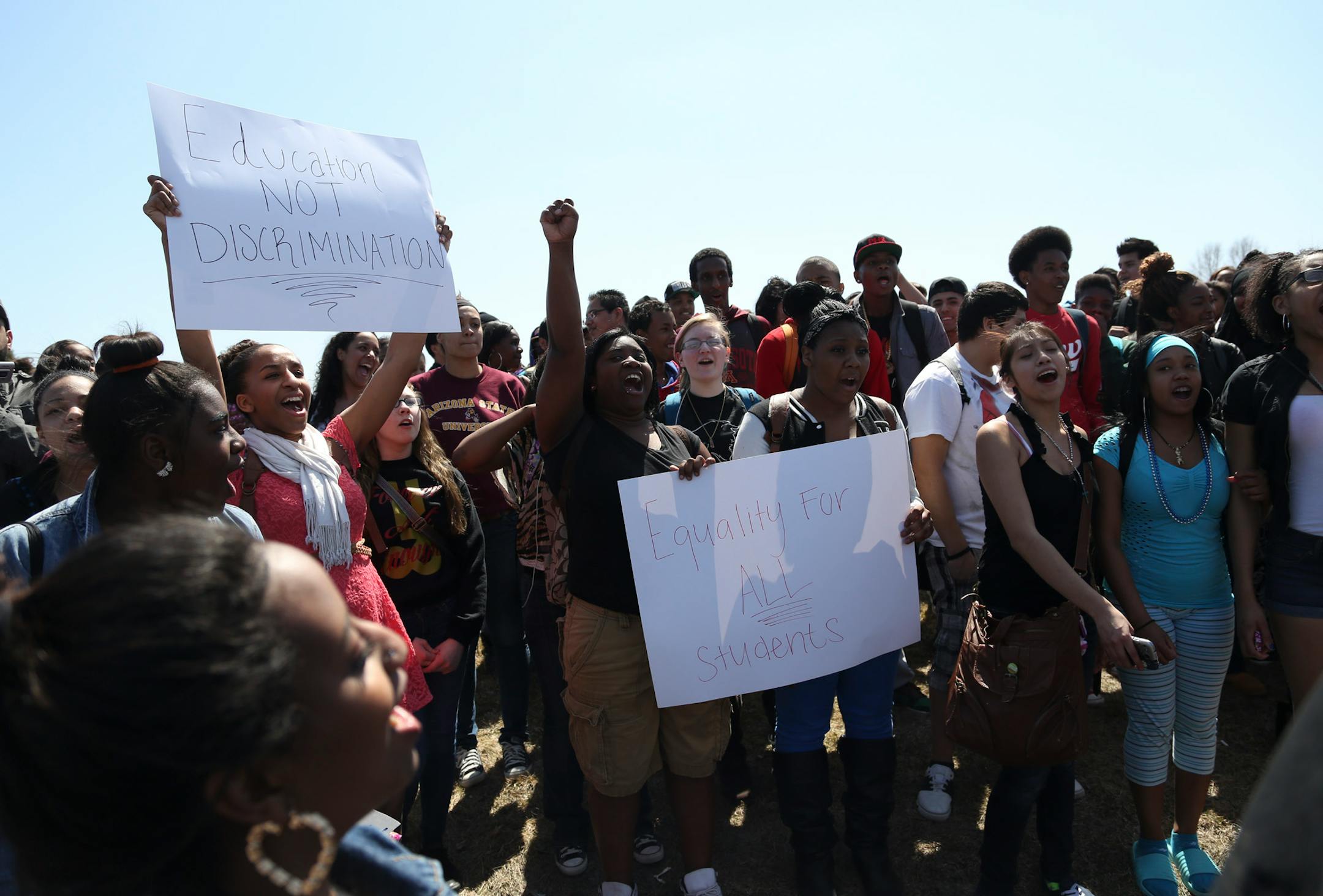 About 150 students at Hopkins High School staged a walkout Friday afternoon to protest what they called unfair treatment of minority students at the 1,800-student school in Minnetonka.