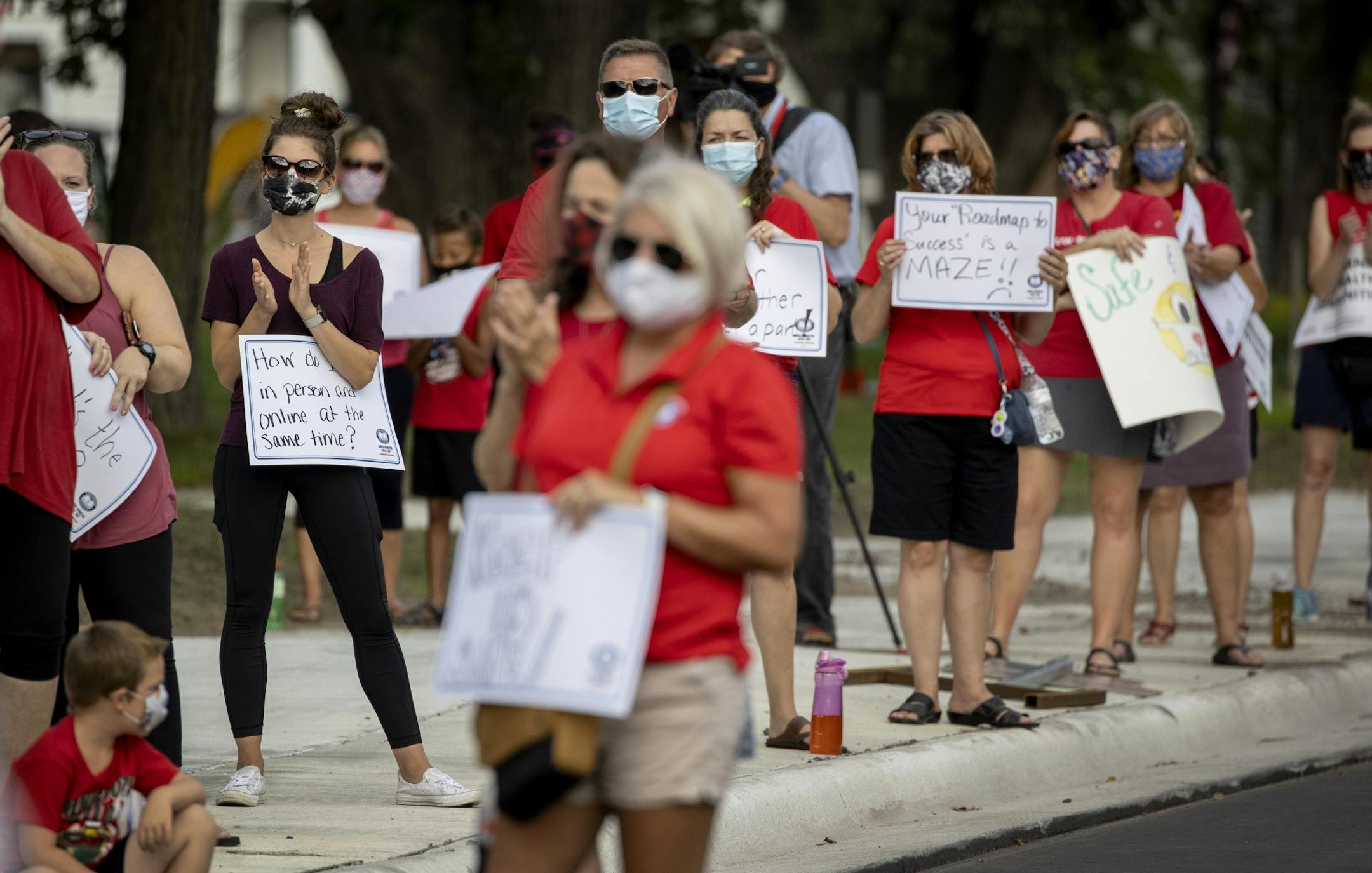 A rally was held ahead of an Aug. 24 school board meeting at Sandburg Education Center in Anoka by members of Anoka-Hennepin Education Minnesota.