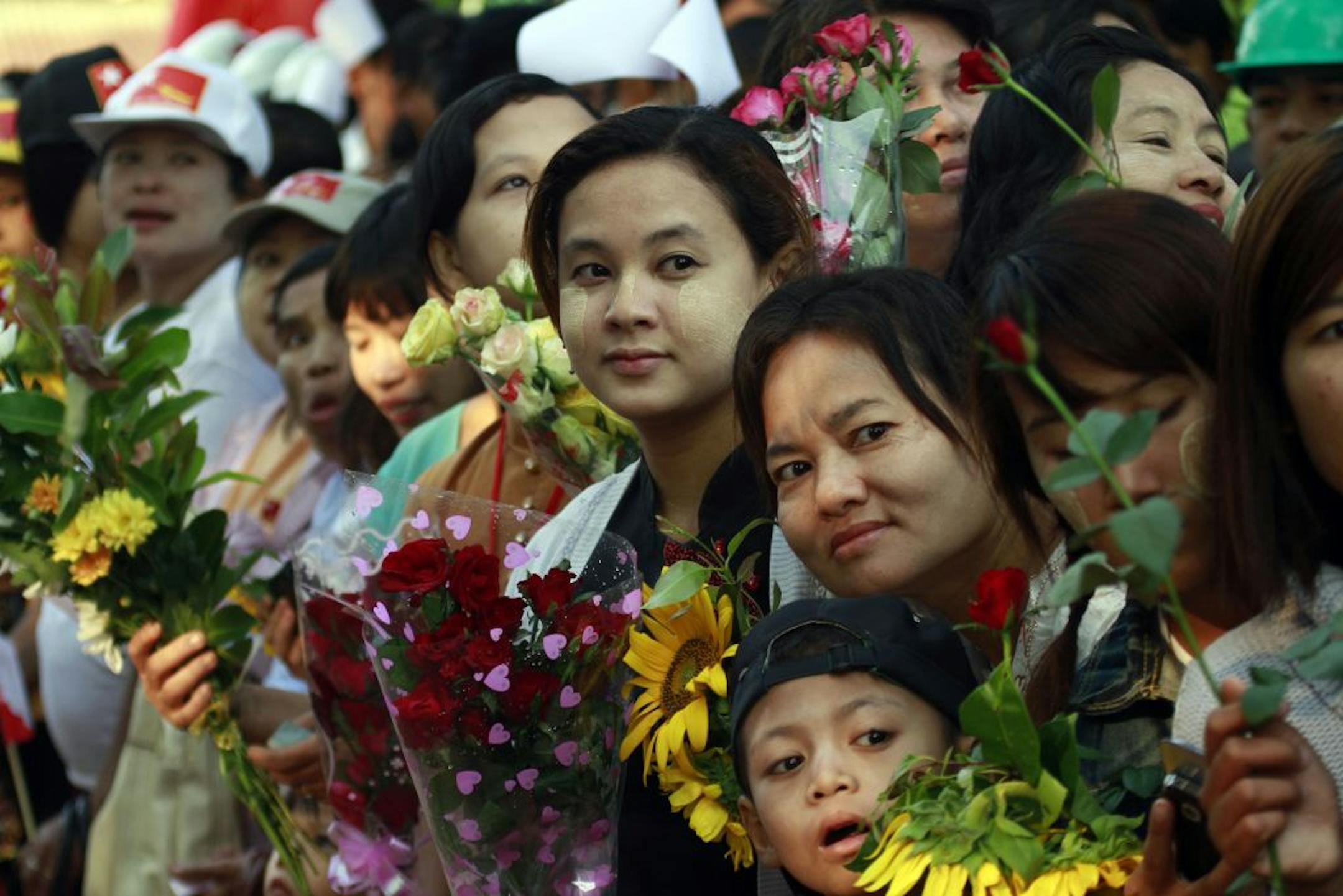 Thousands of supporters in Myanmar's countryside cheered opposition leader Aung San Suu Kyi during her first campaign tour for parliament.