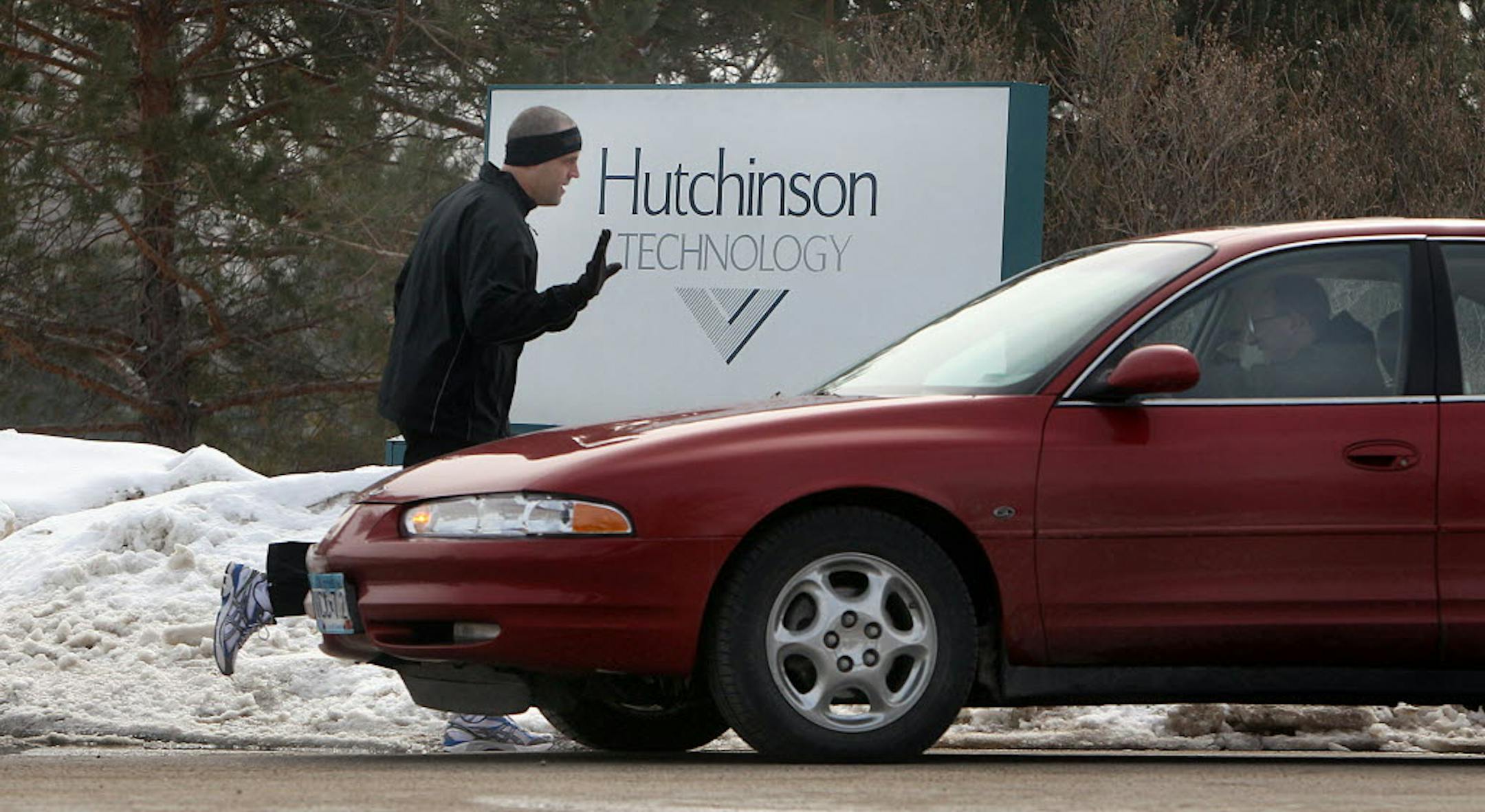 Employee Greg Peller left the grounds of Hutchinson Technology around noon for his daily, five-mile run.