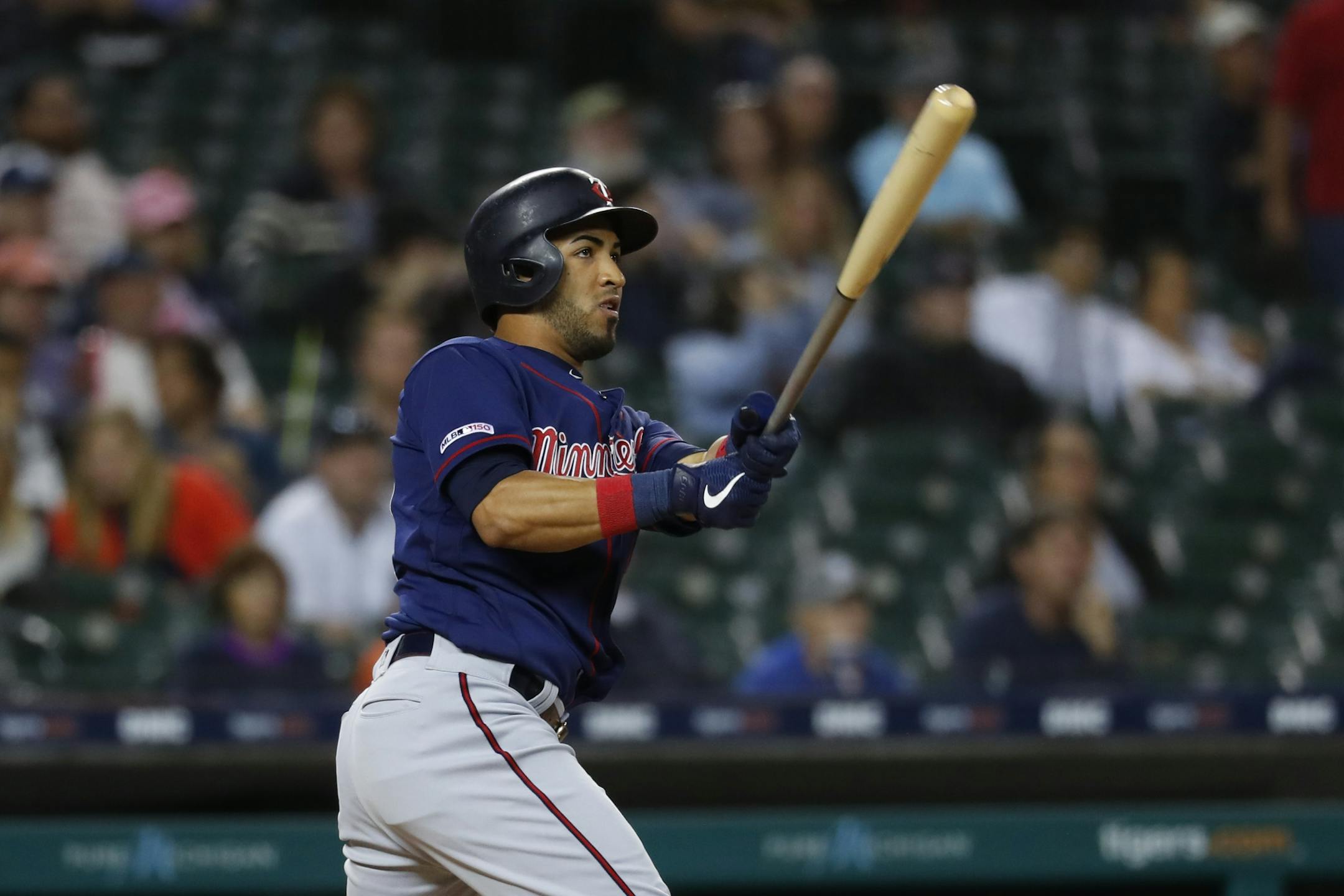 Minnesota Twins' Eddie Rosario hits a two-run home run in the eighth inning of a baseball game against the Detroit Tigers in Detroit, Wednesday, Sept. 25, 2019.