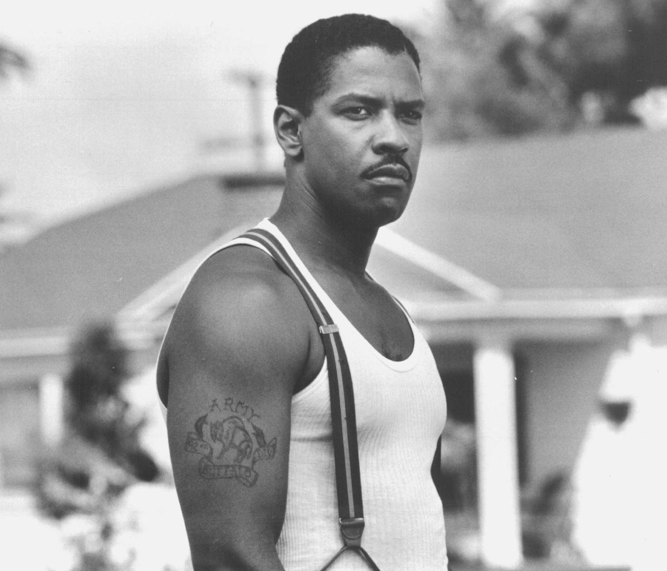 Denzel Washington plays Ezekiel "Easy" Rawlins, a man who is drawn into a web of intrigue when he takes a job locating a missing beauty, in TriStar Pictures' mystery thriller, "Devil In A Blue Dress." Bruce W. Talamon