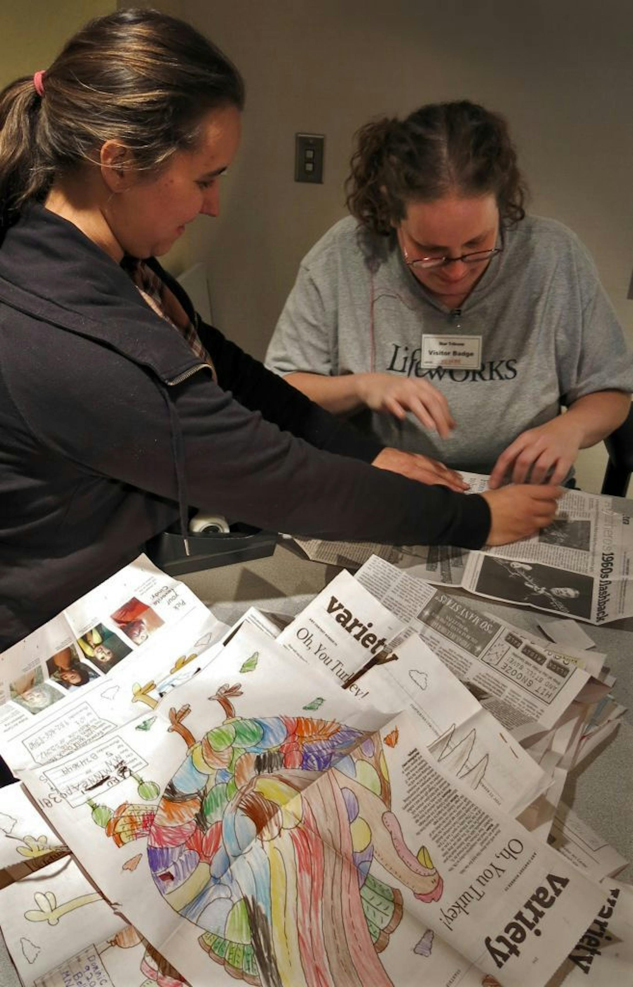 2012 turkey contest , - triage ,- Michelle Pusari, ( left) and Rachel Popper ( right) work to mend the entries that might have been damaged in opening the packaging, before they go on to judging. } Tom Sweeney, star tribune, Minneapolis, MN 12/10/2012