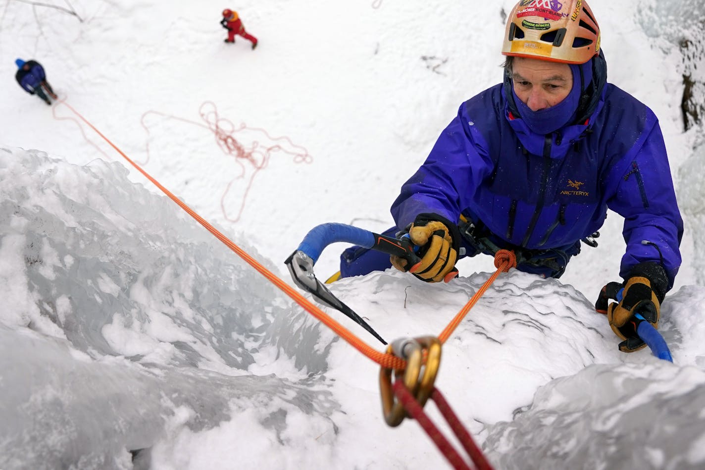 Lou Renner search for the final spot to drive in his ice axe as he topped out on an ice route Wednesday afternoon at Robinson Park. ] ANTHONY SOUFFLE • anthony.souffle@startribune.com