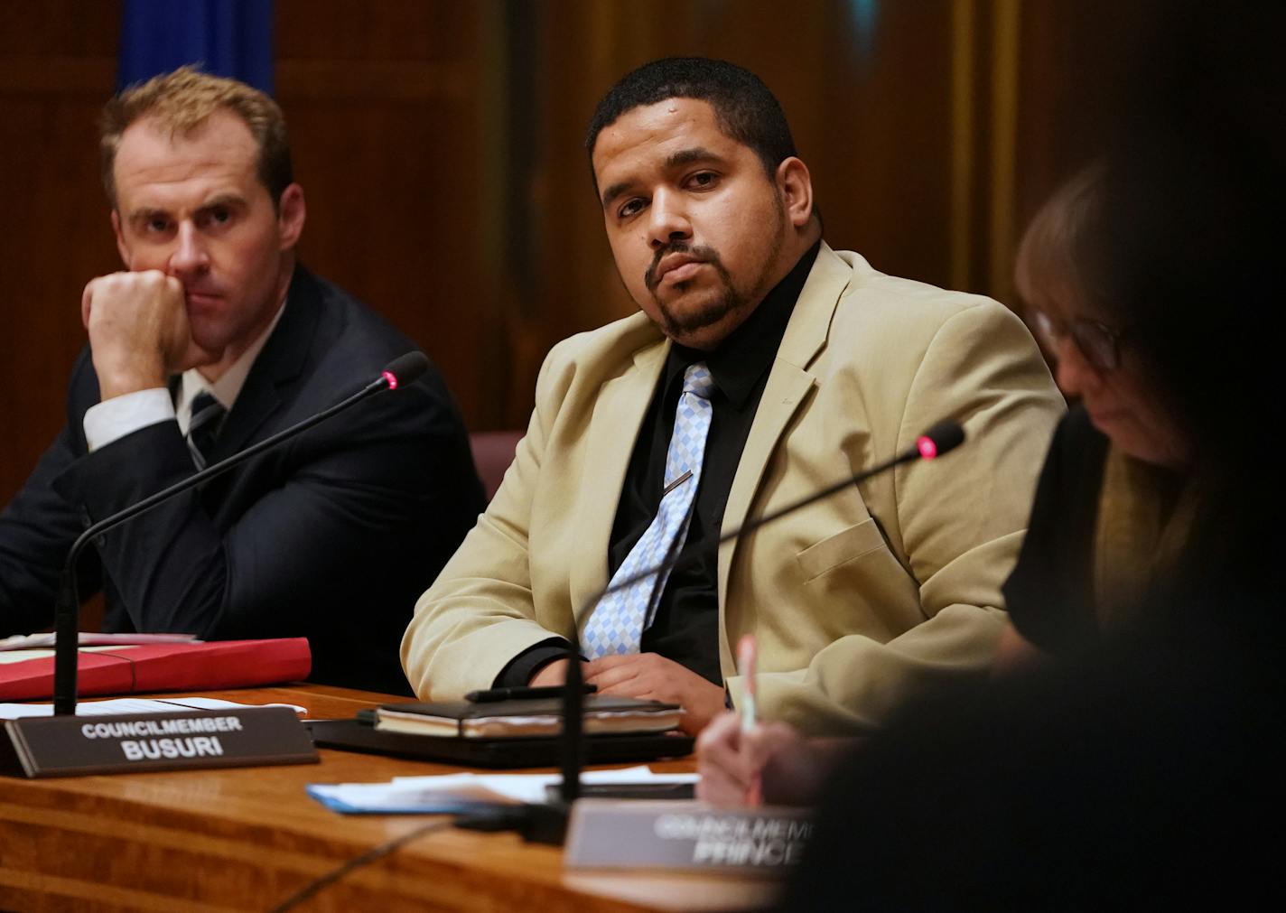 Kassim Busuri is the interim St. Paul City Council member whose decision to run for the open Sixth Ward seat, despite pledging not to, has isolated him from fellow council members. On the left is Chris Tolbert who holds him to his pledge not to run for office this fall.]Shortly after Busuri announced his candidacy, other council members removed him from a public safety awork group and started deleting his name from agenda items related to his ward. Busuri says his colleagues are being "childish"