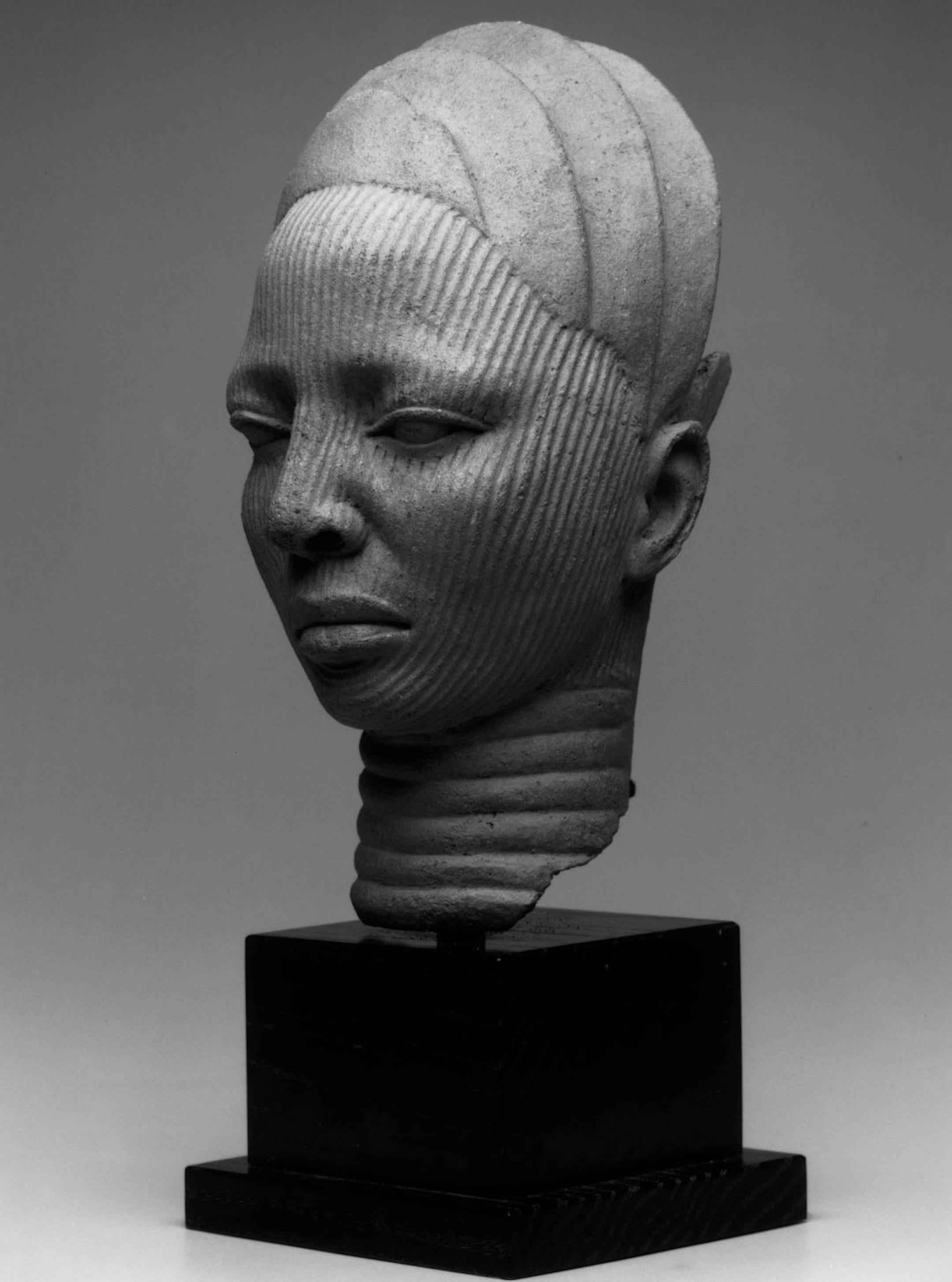 This terra cotta sculpture "Shrine Head," from what is now Nigeria, has been traced to Ife, the sacred city of the Yoruba people in western Africa. Between 600 and 900 years old, it portrays an important woman.