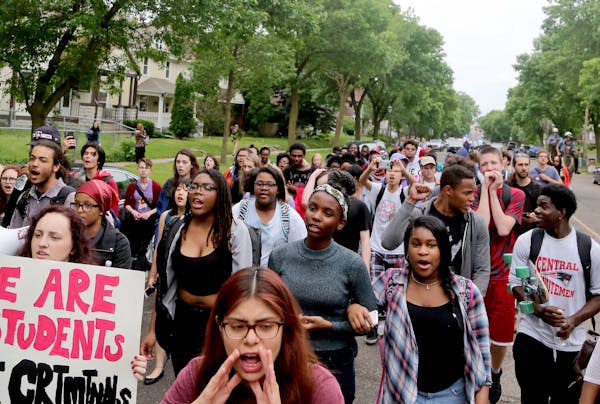 St. Paul Central High School students and some supporters march down Marshall Ave. towards City Hall Tuesday, May 31, 2016, in St. Paul, MN. The stude