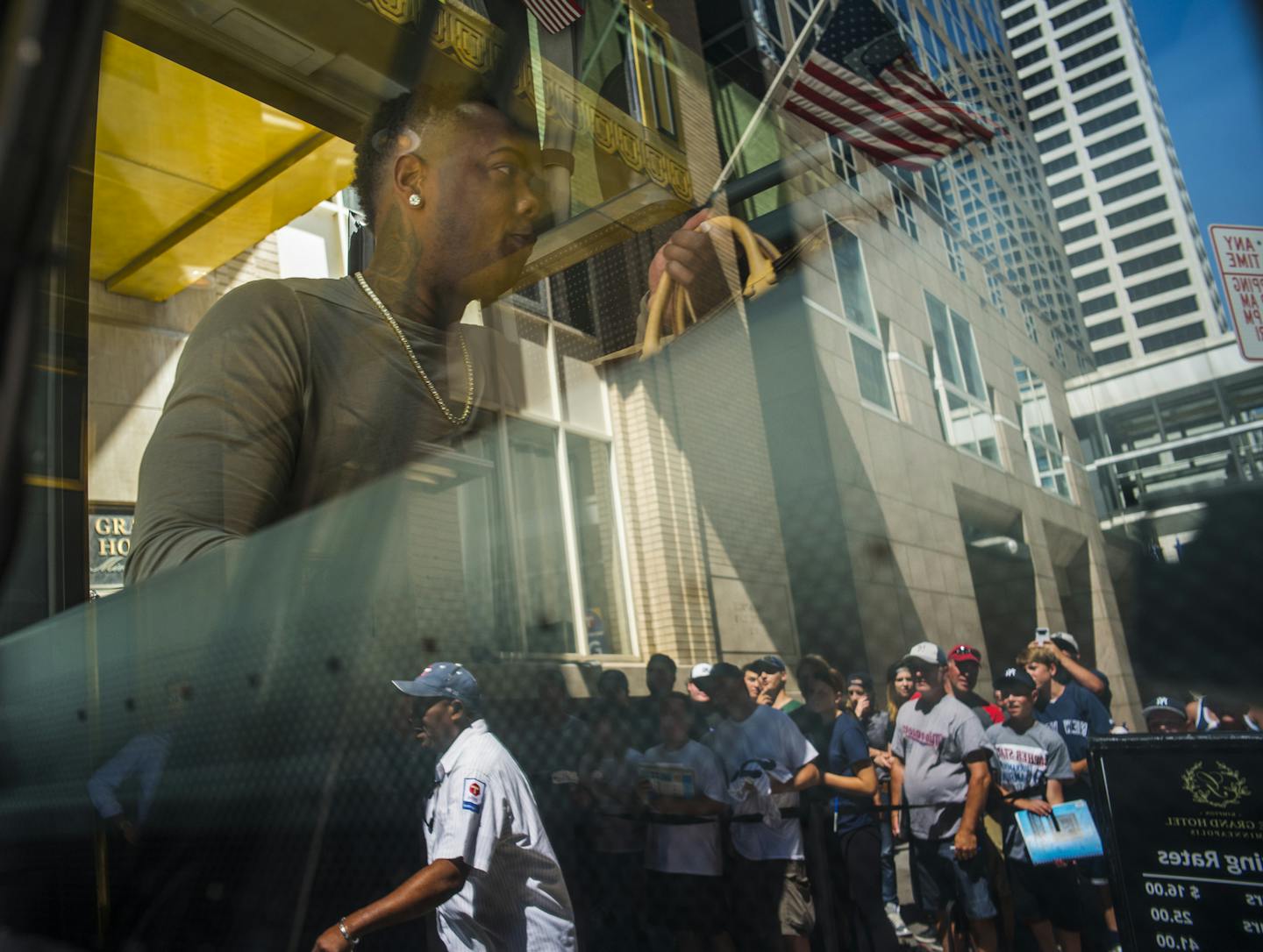 Yankees closer Aroldis Chapman boarded a bus outside the Grand Hotel while autograph seekers queued up.