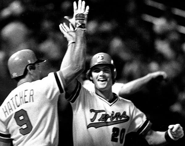 September 12, 1981: Mickey Hatcher gave Dave Engle a high five after Engle hit his first major league home run to lead the Twins to a 4-3 victory over