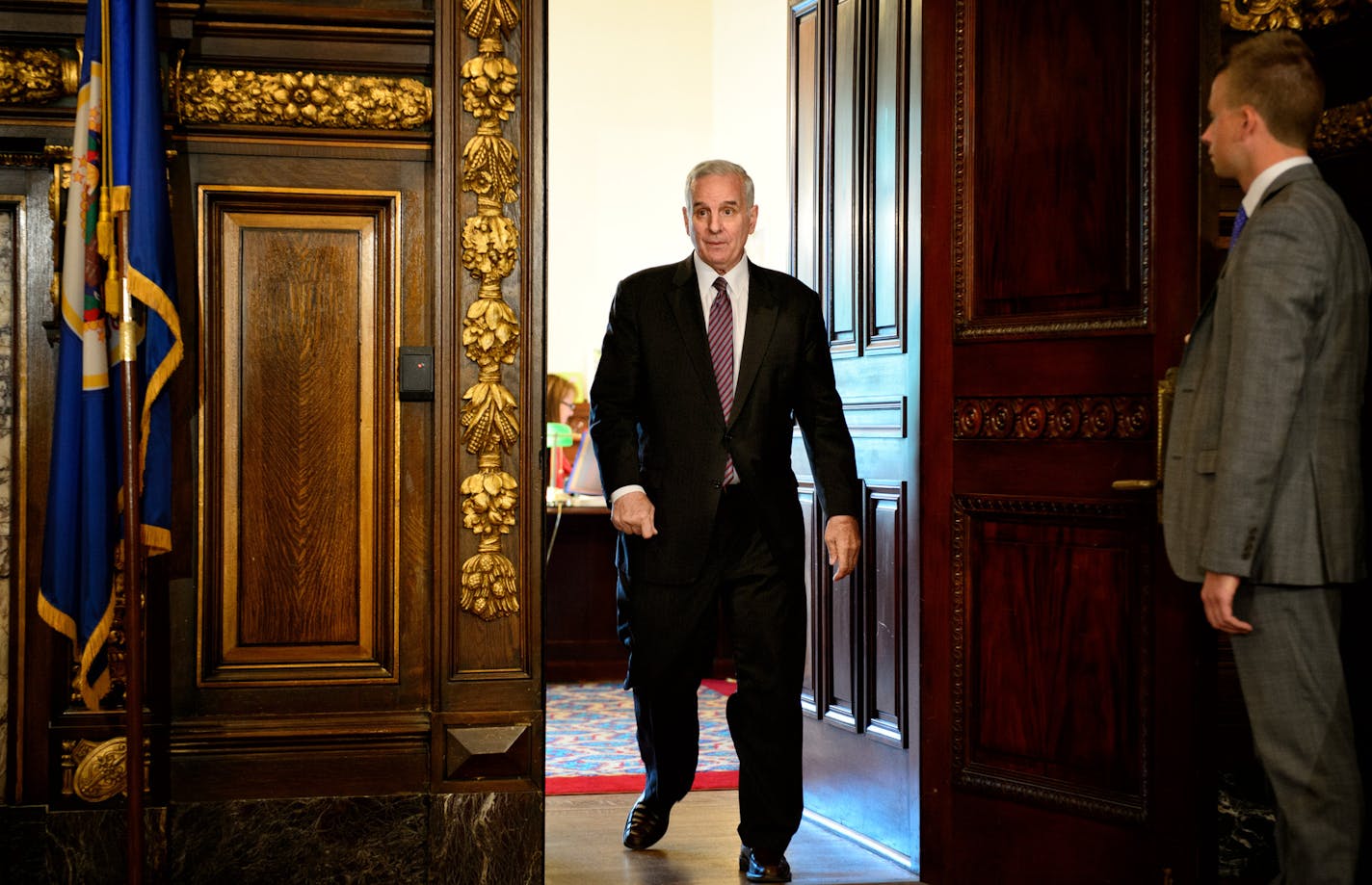 Walking with a slight limp, Governor Dayton entered his news conference Tuesday, October 22, 2013, the day before he enters Mayo Clinic for an outpatient procedure on his injured hip. He answered questions on a range of issues including the hip procedure, ACA rollout and online voter registration for Minnesota. ] GLEN STUBBE * gstubbe@startribune.com