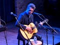 Cancer survivor Joe Henry uplifts with artful songs and reaffirming words in Minneapolis