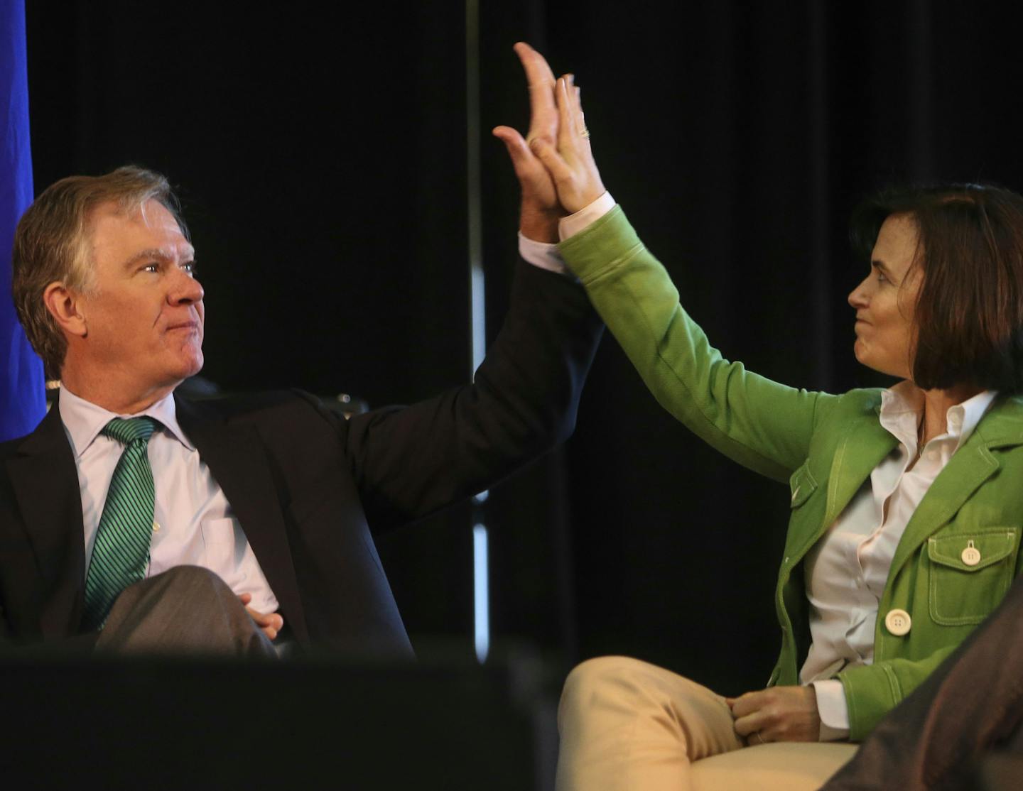 During a pre-ribbon cutting ceremony St. Paul mayor Chris Coleman and Minneapolis mayor Betsy Hodges exchange high fives Saturday, June 14, 2014, at Union Station in St. Paul, MN.] (DAVIDJOLES/STARTRIBUNE) djoles@startribune.com After more than a decade of planning and nearly a billion dollars of public money, the Twin Cities' second light-rail line begins running Saturday as officials cut ribbons for the Green Line.