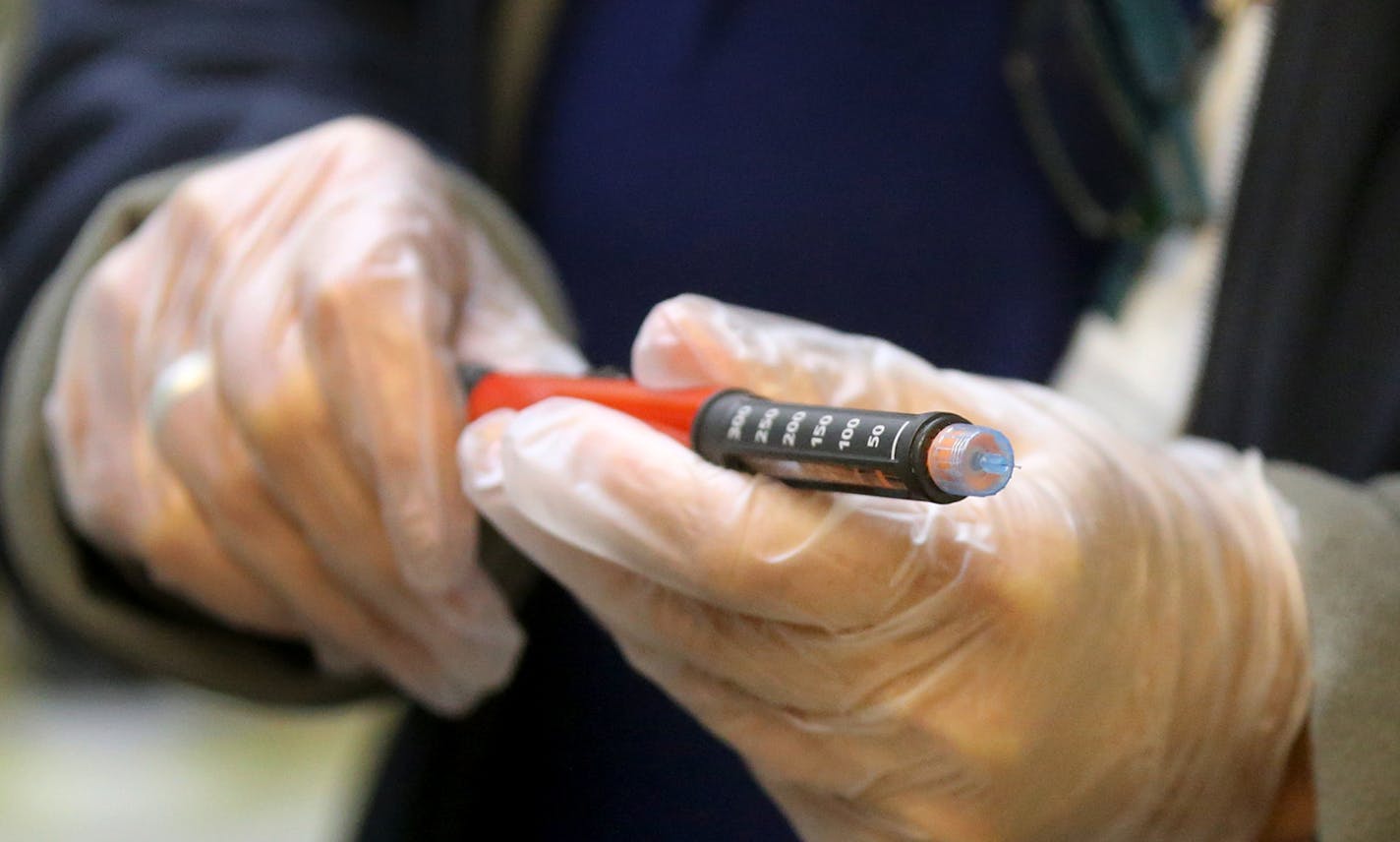 Jolie Holland, left, a Licensed School Nurse in the Howard Lake-Waverly-Winstead School district, prepares an insulin pen for an injection for a young student with diabetes at Winstead Elementary School Wednesday, Sept. 25, 2019, in Winsted, MN.] DAVID JOLES &#x2022; david.joles@startribune.com Sure, there are band-aids and ice packs to hand out, and vision screenings to administer. But the job of school nurses has become a far more complex -- and demanding --role at schools around Minnesota. To