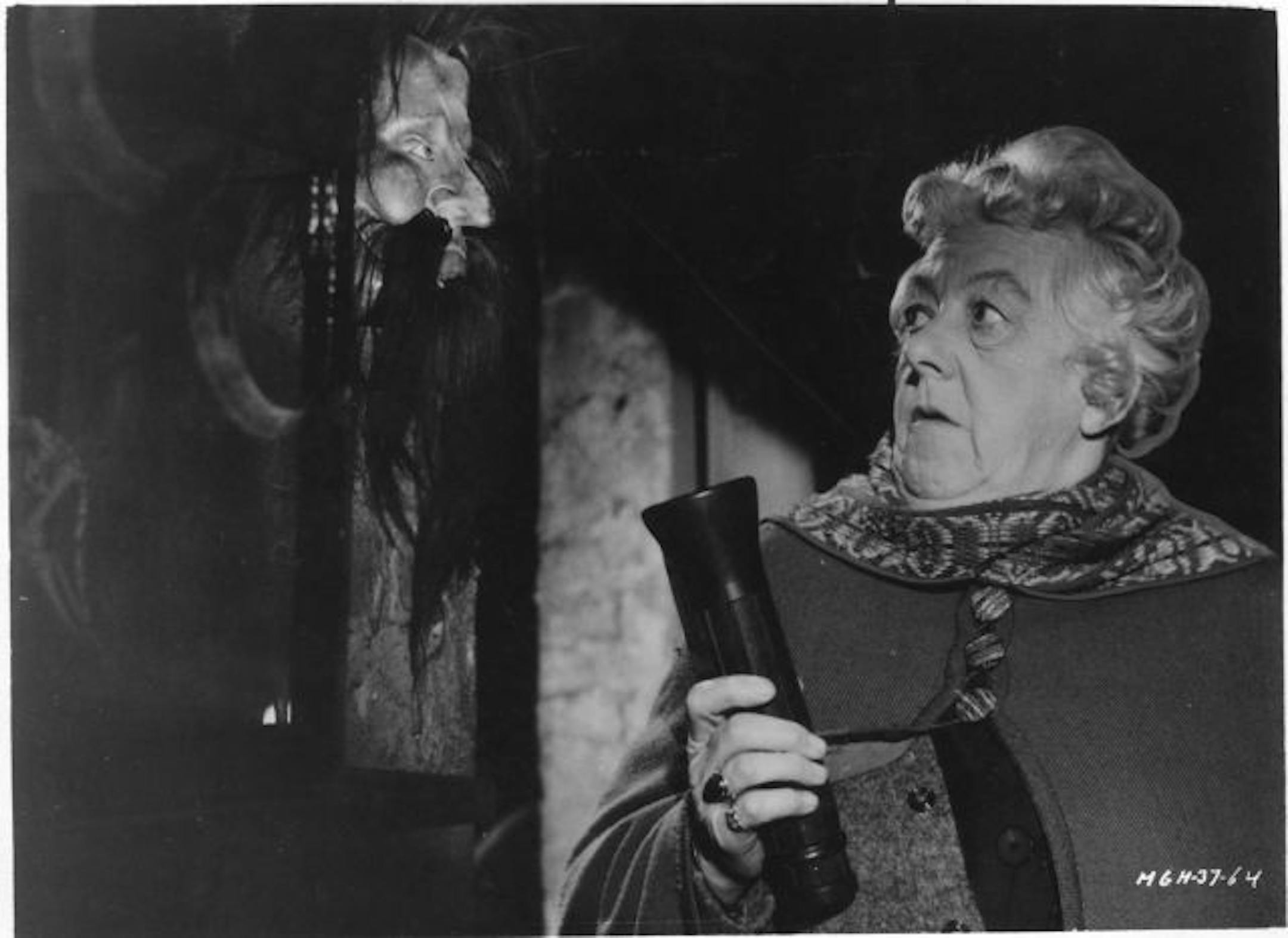 Margaret Rutherford was perfectly cast as the tweedy dowager Miss Marple in MGM's "Murder, She Said" (1961). Below, author Agatha Christie.