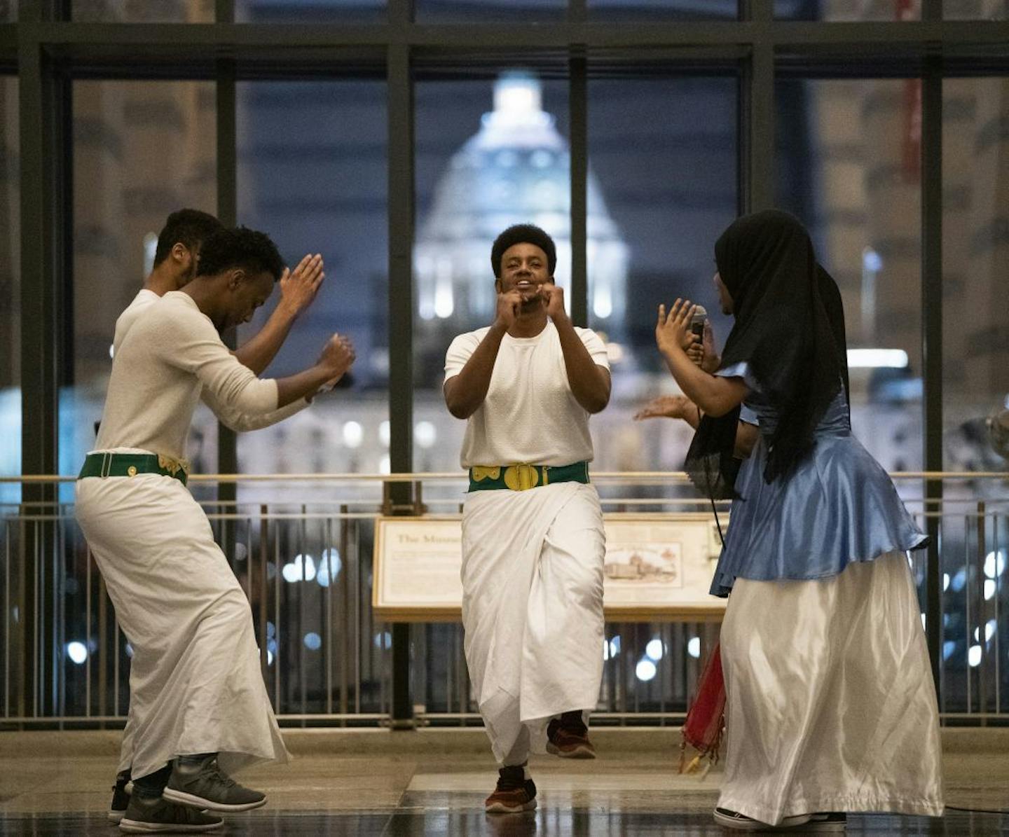 Somali Museum Dance Troupe members, including Rami Mouhoumed, center, perform the Somali dance called Dhanto.