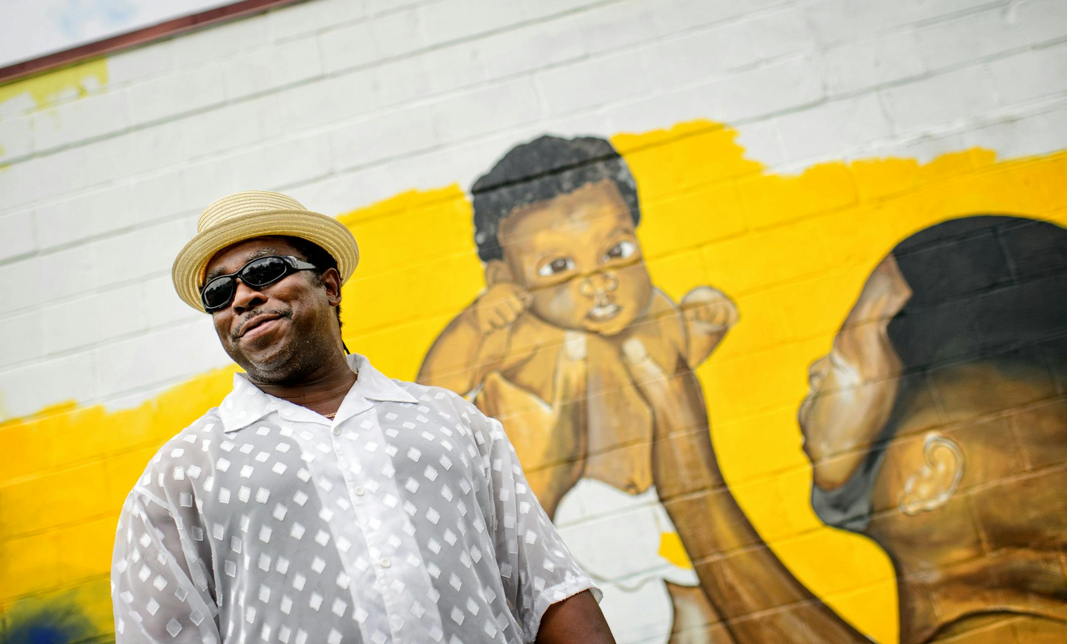 Artist Charles Caldwell is painting this mural as part of the Flow Northside Arts Crawl. ] GLEN STUBBE * gstubbe@startribune.com Friday, July 10, 2015 The Flow Northside Arts Crawl, in its tenth year, showcases the growing arts scene in North Minneapolis. Advancing the 7/23 festival. Artistic director Dudley Voight will take us on a tour of murals and galleries along West Broadway -She will take us to a deli where a local artist is putting up new work, the Juxtaposition center where kids are mak
