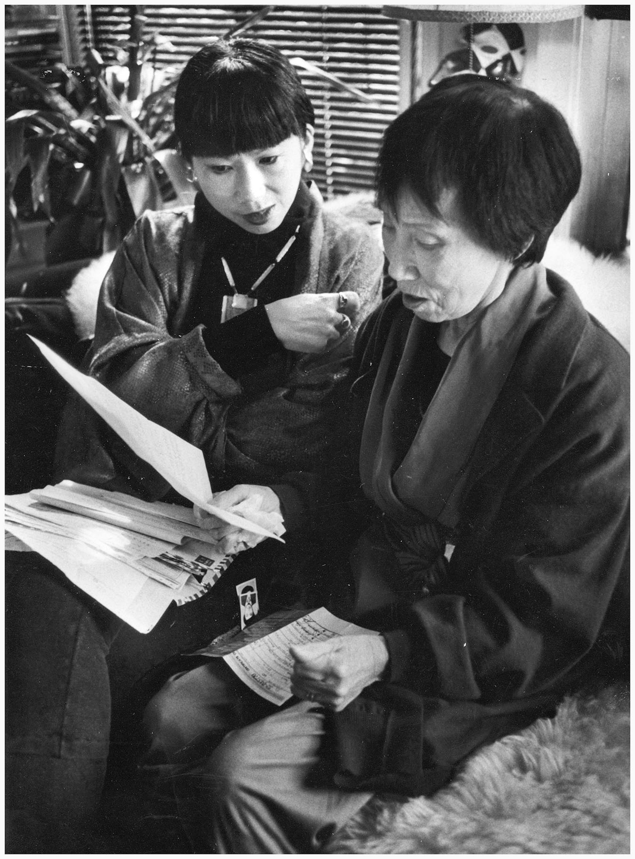 San Francisco, 1989: Amy Tan and her mother, Daisy, read a letter from Tan's half-sister Lijun.