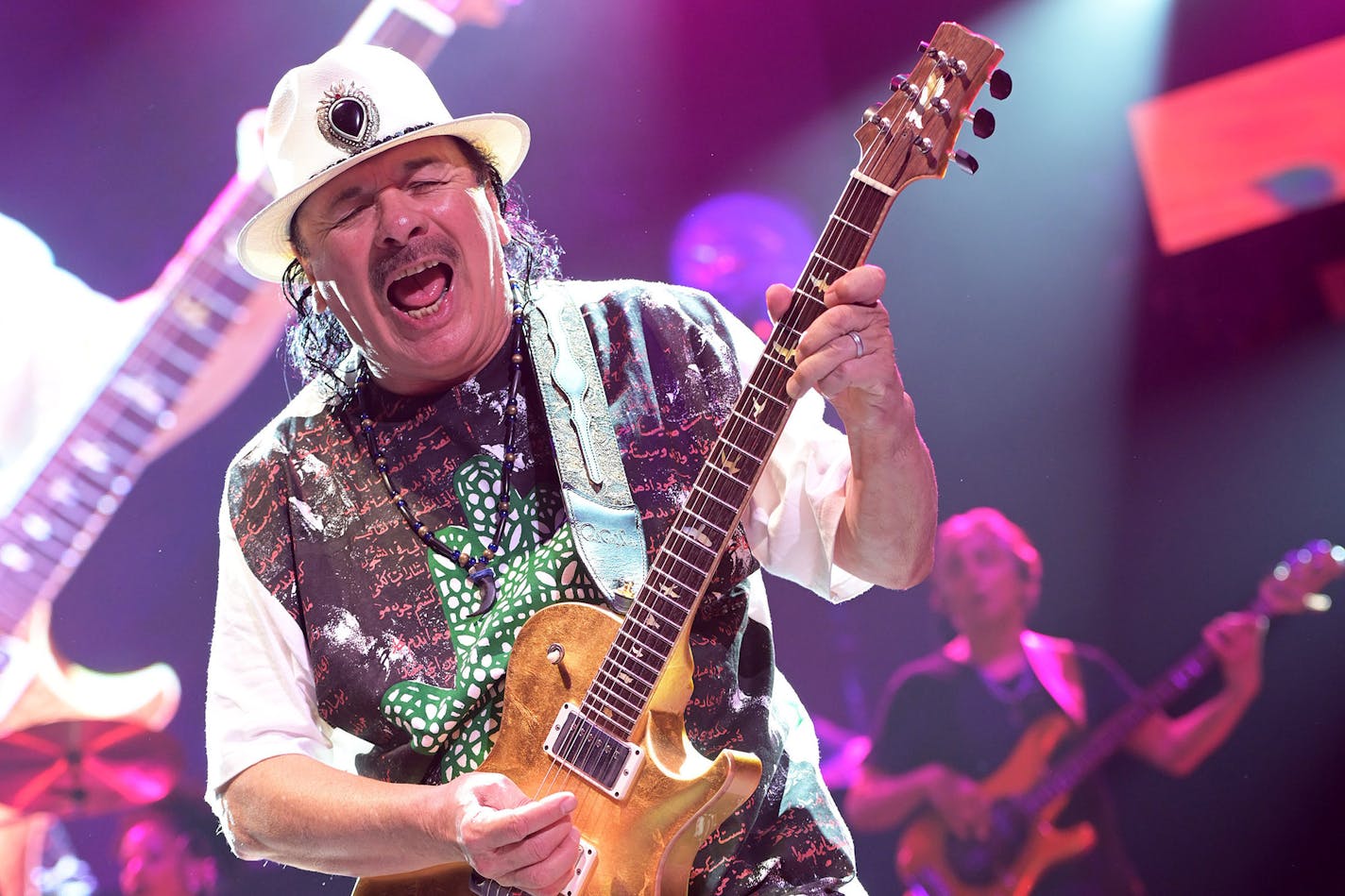 Santana was having a fine time Saturday night at Xcel Energy Center. At times he almost seemed to forget there was an audience.