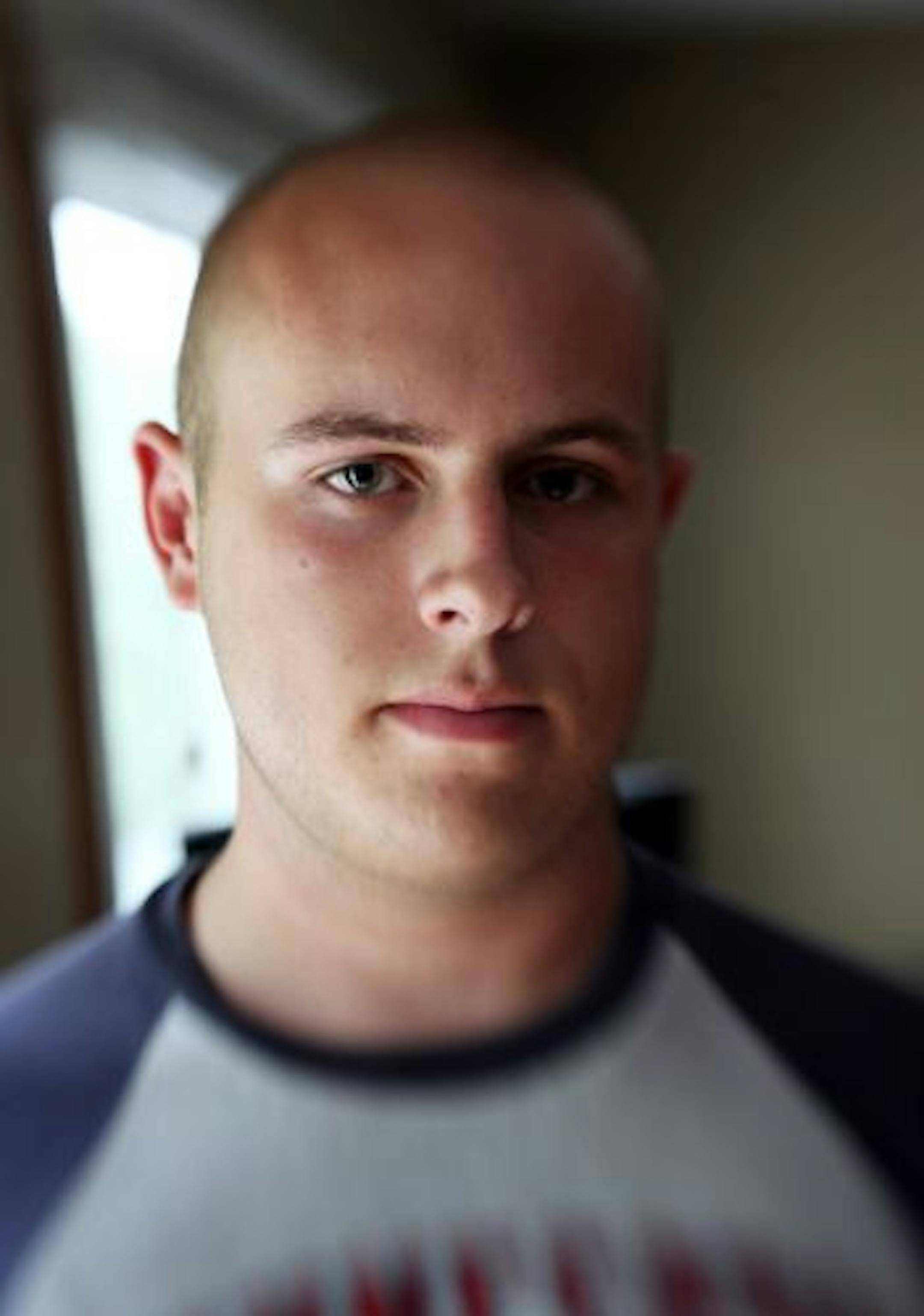 Anoka-Hennepin School District has agreed to pay a $25,000 settlement to the family of Alex Merritt (pictured) after two teachers made jokes that lead to constant teasing from peers and eventually caused him to switch schools. Meritt posed for a picture in his home in Elk River. Merritt is going to into the Army in a couple weeks.