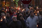 The crowd joined together to sing "This Little Light of Mine" at the conclusion of the candlelight vigil Sunday night attended by 1,000 in Delano.
