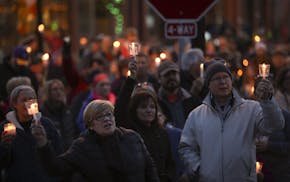 The crowd joined together to sing "This Little Light of Mine" at the conclusion of the candlelight vigil Sunday night attended by 1,000 in Delano.