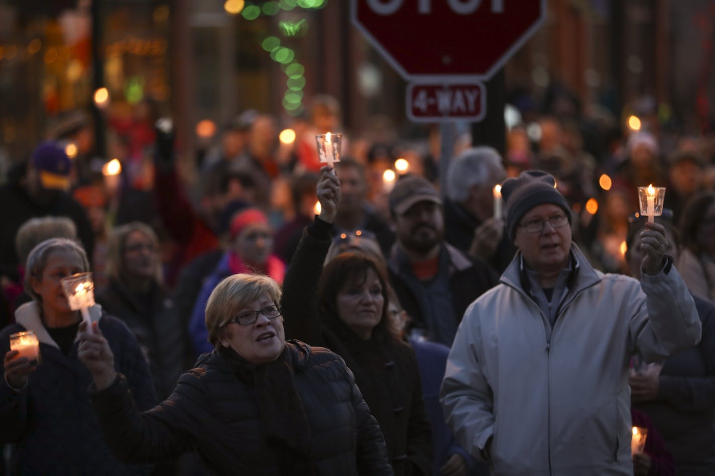 The crowd joined together to sing "This Little Light of Mine" at the conclusion of the candlelight vigil Sunday night attended by 1,000 in Delano.