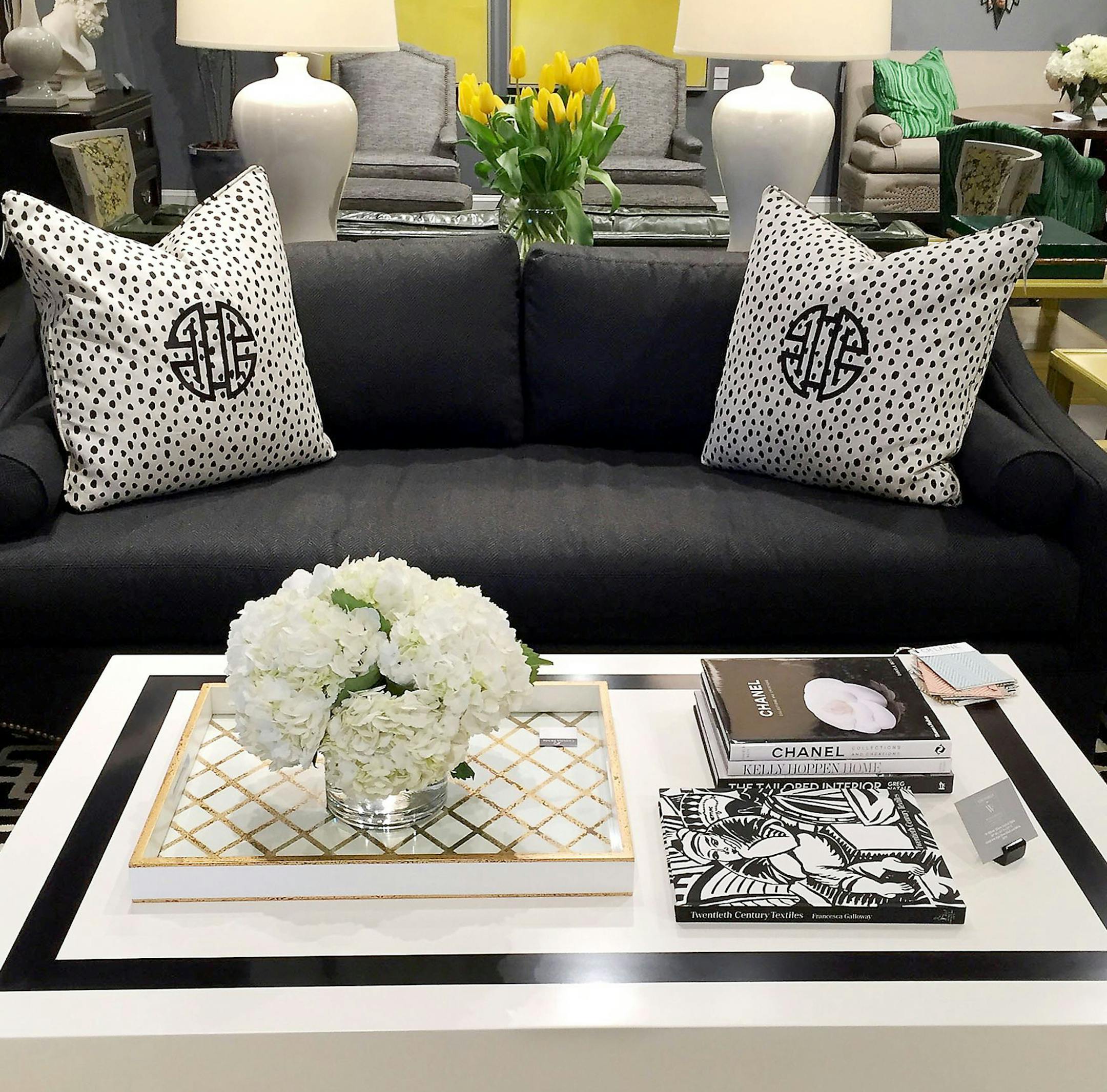 A Tobi Fairley coffee table is paired with her Eva sofa for C.R. Laine in Derek Onyx fabric. (Patricia Sheridan/Pittsburgh Post-Gazette/TNS) ORG XMIT: 1195575