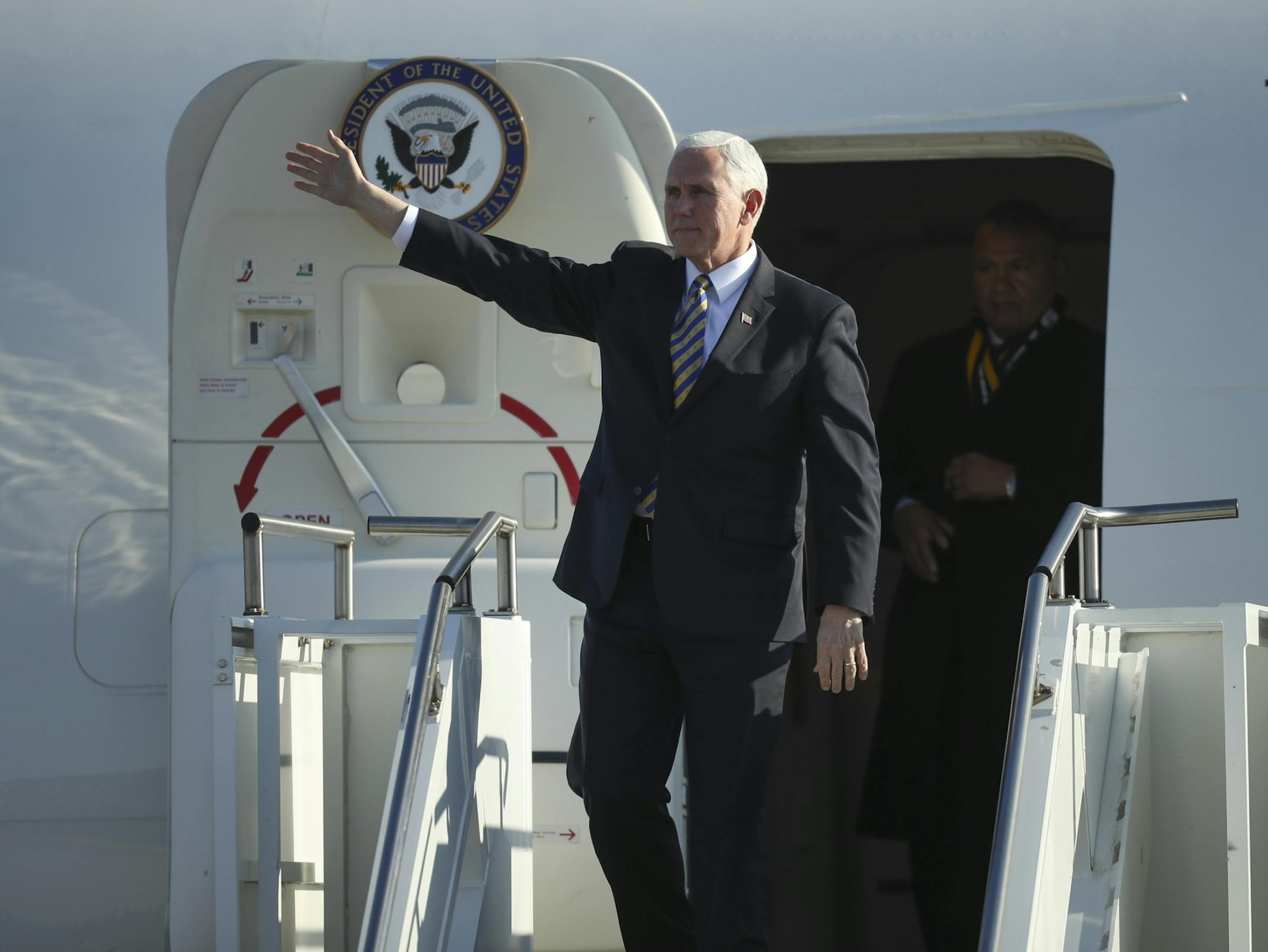 Vice President Mike Pence waved to the crowd of guests waiting to greet him at the Minnesota National Guard - 934th Airlift Wing Tuesday afternoon.