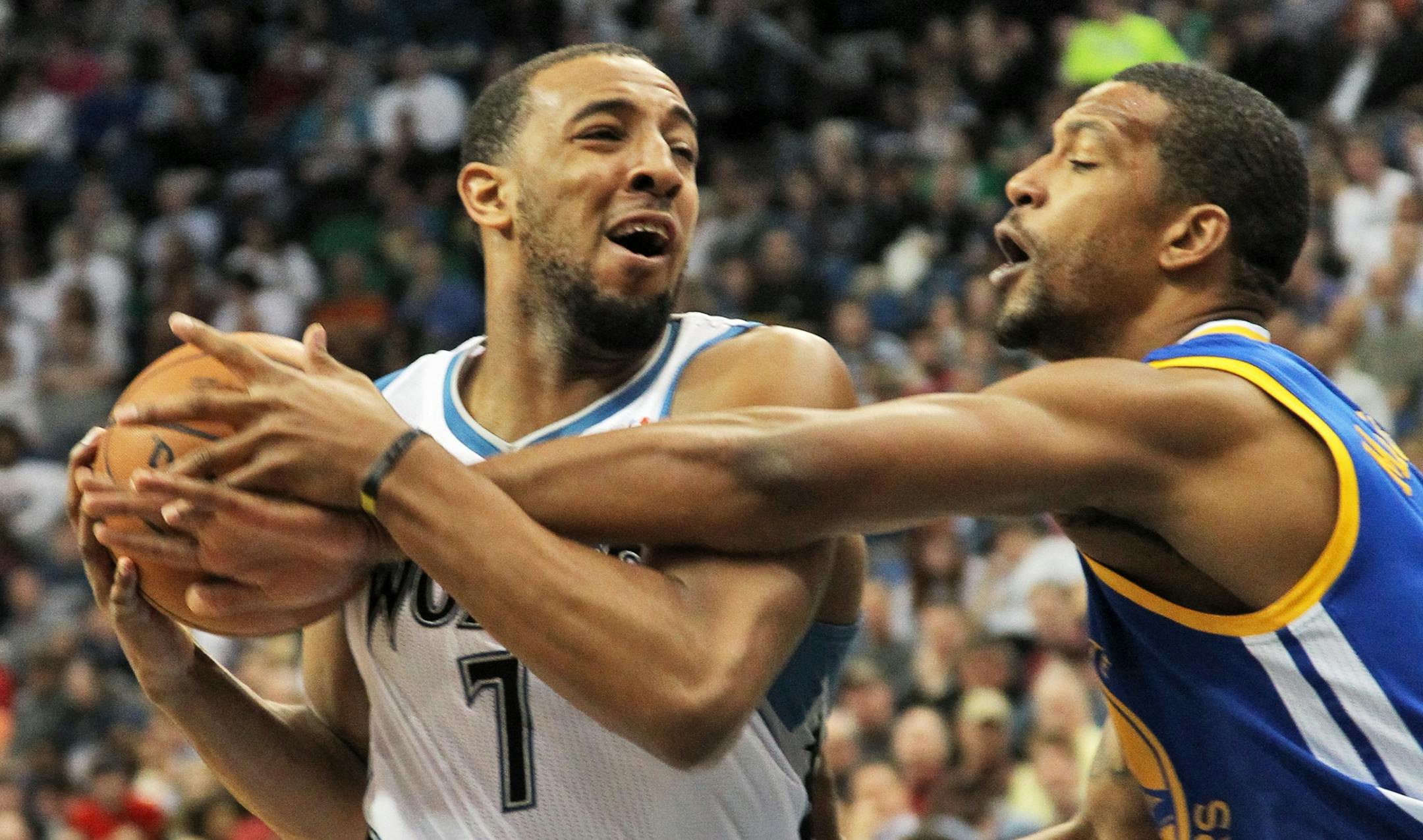 Wolves forward Derrick Williams, left