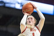 Benilde-St. Margaret`s Olivia Olson goes up for a shot against Alexandria during the girls basketball state tournament at Williams Arena last month.

