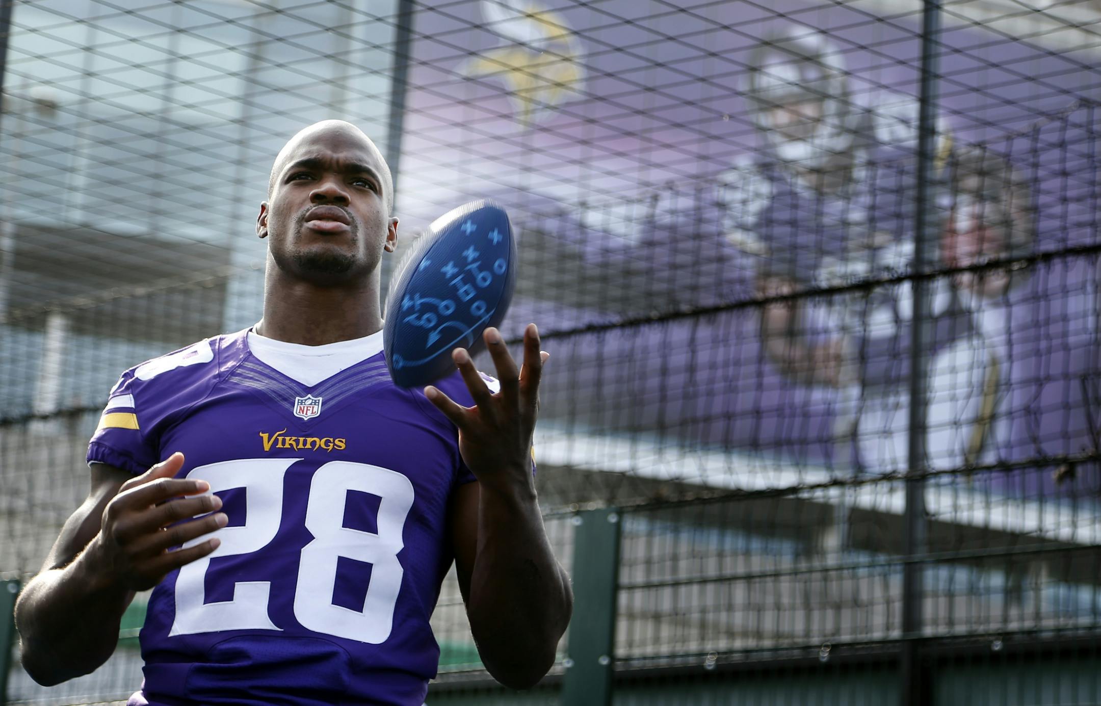 Minnesota Vikings running back Adrian Peterson (28) outside of Wembley Stadium on Tuesday shortly after the team arrived in London for Sunday's game vs. the Pittsburgh Steelers.
