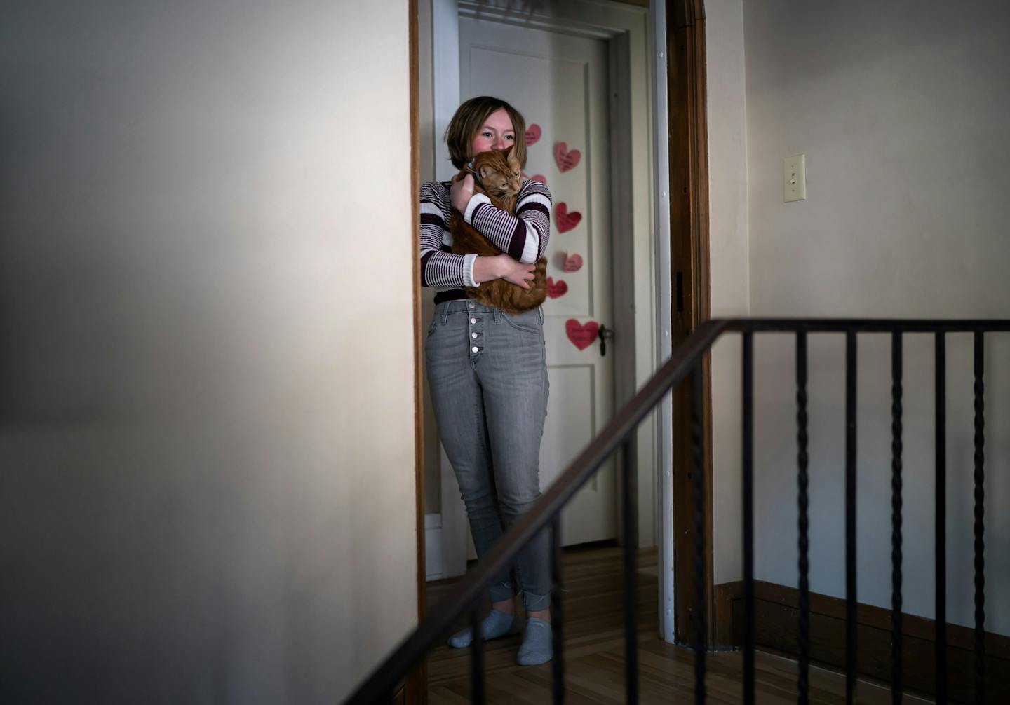 Sienna Stadtmueller hugged one of her cats, Friday, Feb. 25, 2022, in Wayzata. Jill Stadtmueller’s teenage daughter Sienna, 13, has been struggling 