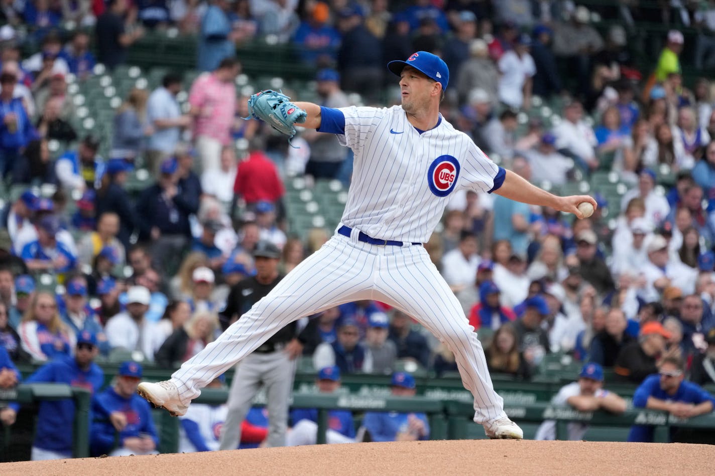 Chicago Cubs starting pitcher Drew Smyly delivers during the first inning of a baseball game against the Miami Marlins on Saturday, May 6, 2023, in Chicago. (AP Photo/Charles Rex Arbogast)