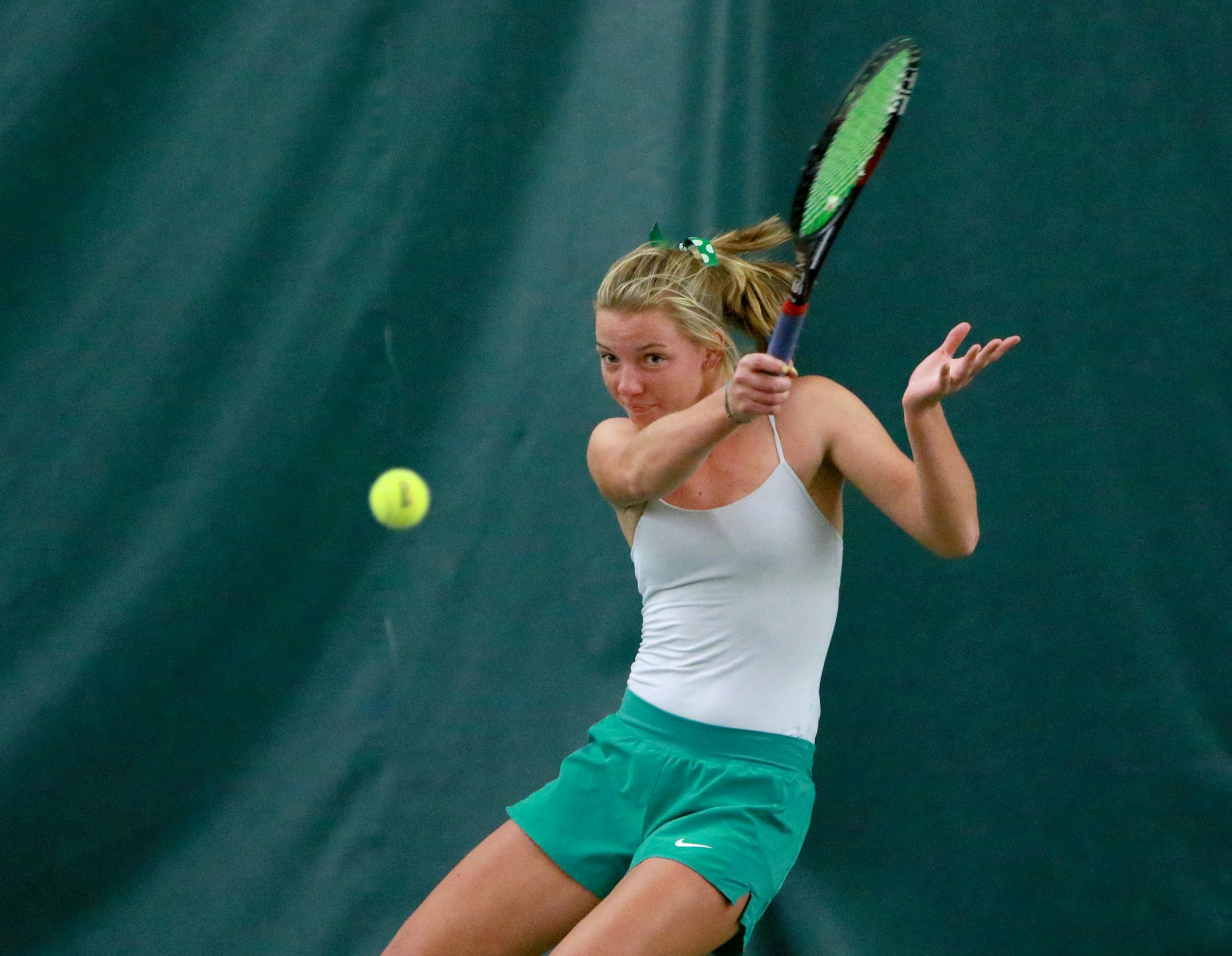 Mounds View's Taylor Trondson battled Eagan's Lauren Ferg in the girls' tennis state tournament team first round Tuesday at the University of Minnesota's Baseline Tennis Center. Photo: DAVID JOLES ï david.joles@startribune.com