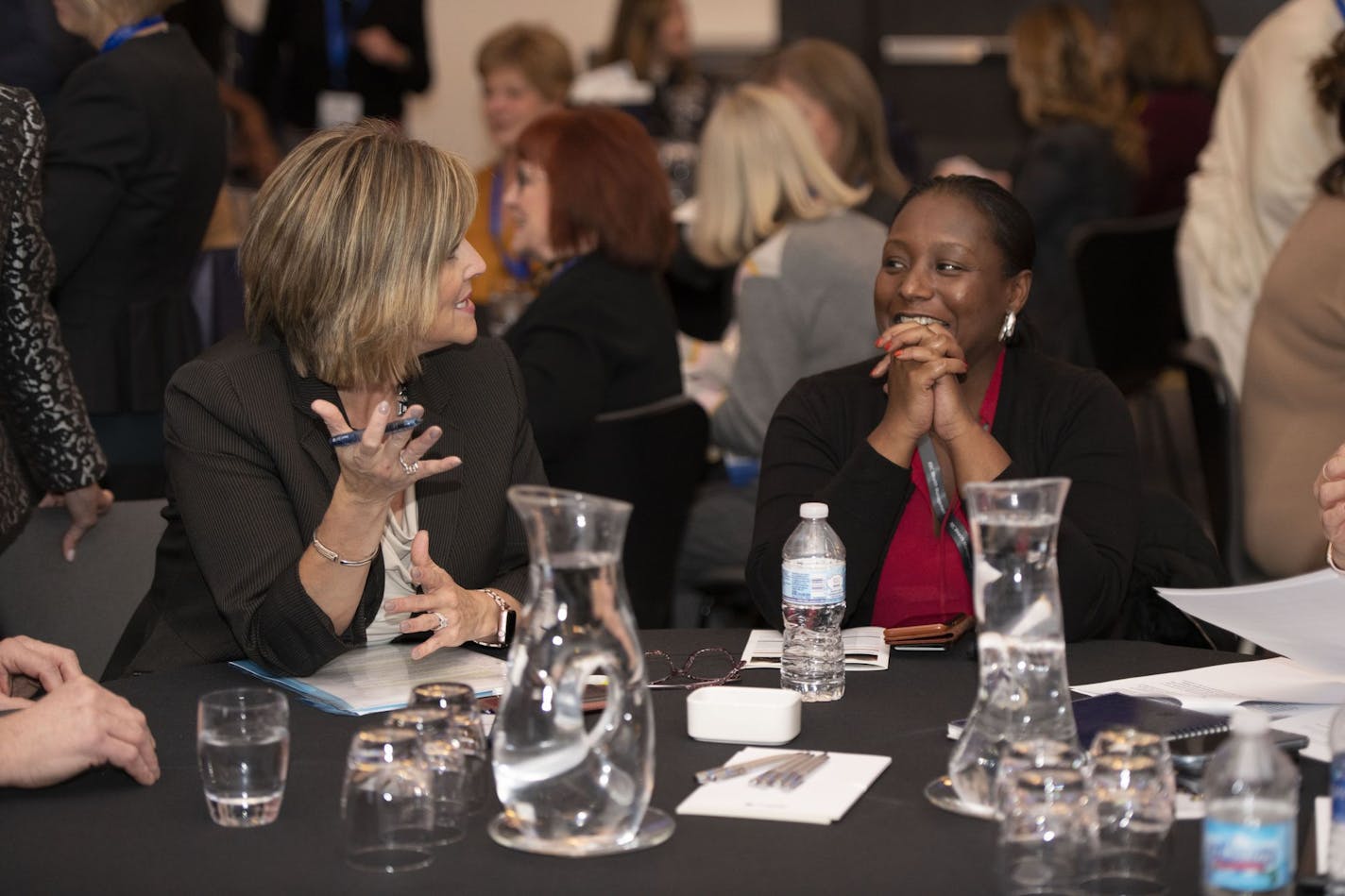 RBC Wealth Management's U.S. Head of Advisor Recruiting & Field Marketing Kristen Kimmell (left) chats with Initiatives Manager Shevawn Jester during the Women's Assoc. of Financial Advisors Conf. held in Nov. in Minneapolis.