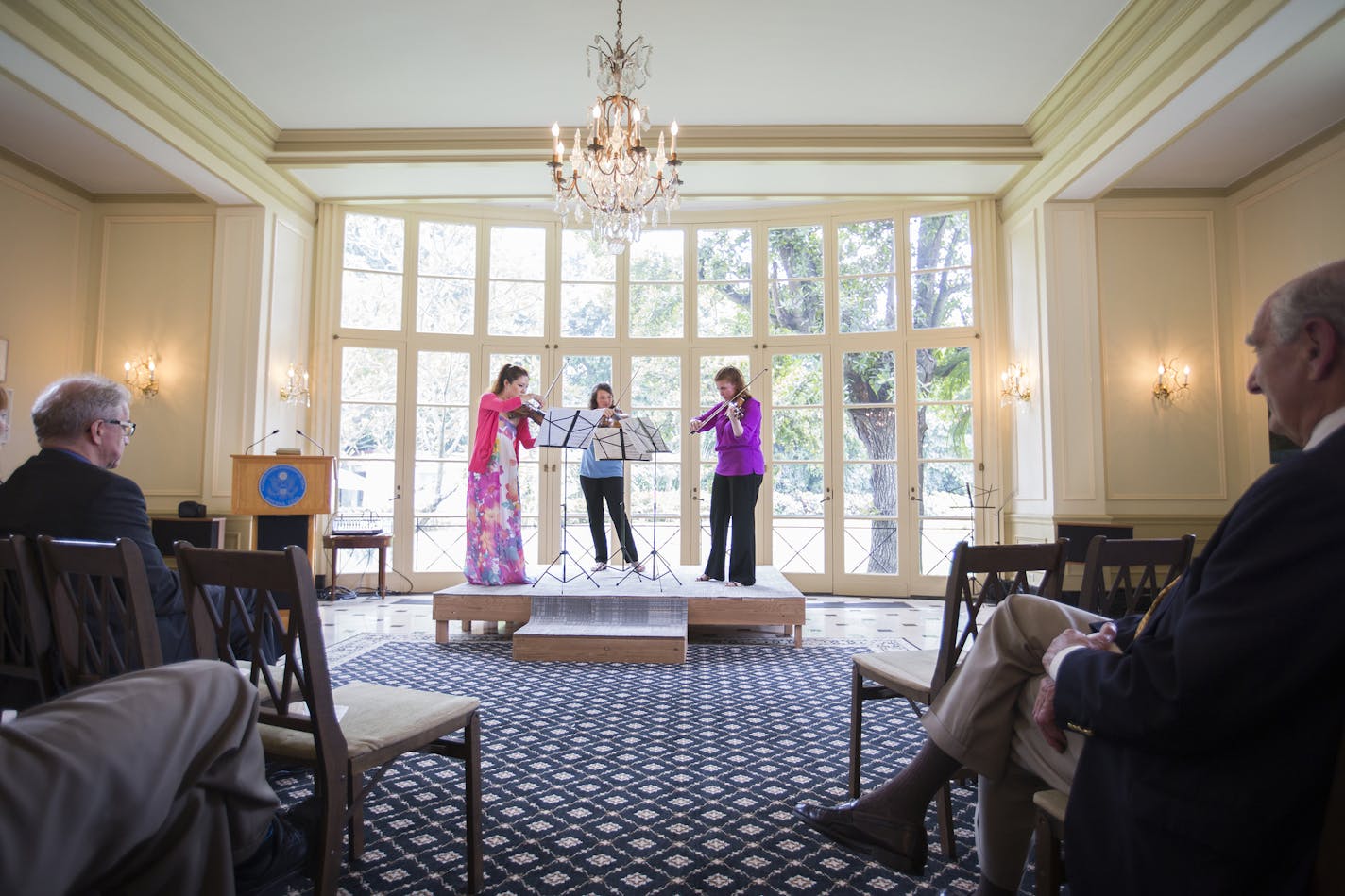 A group from the Minnesota Orchestra plays for the People to People Tour group from Minnesota during a visit to the residence of the U.S. Chief of Mission in Havana, Cuba on Friday.