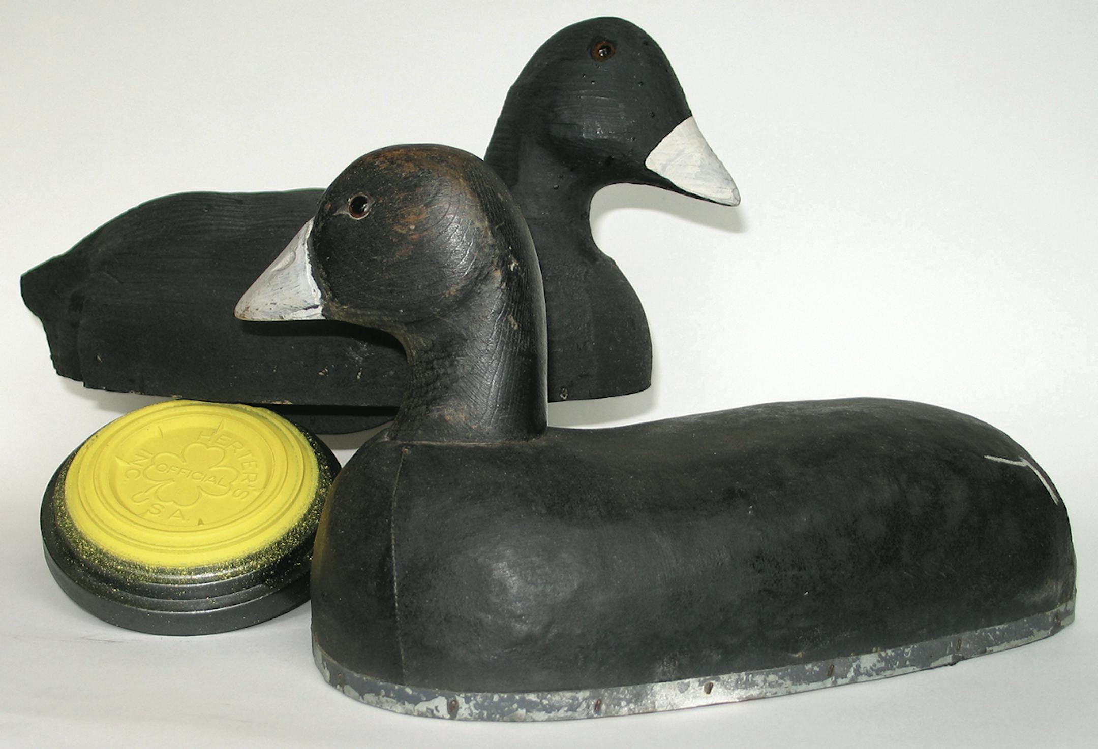 In the front is a Herter's cloth over cork decoy from 1941, and in the rear is a 1948-era decoy made from balsa wood, alongside a Herter's clay pigeon. Photo courtsey Doug Lodermeier