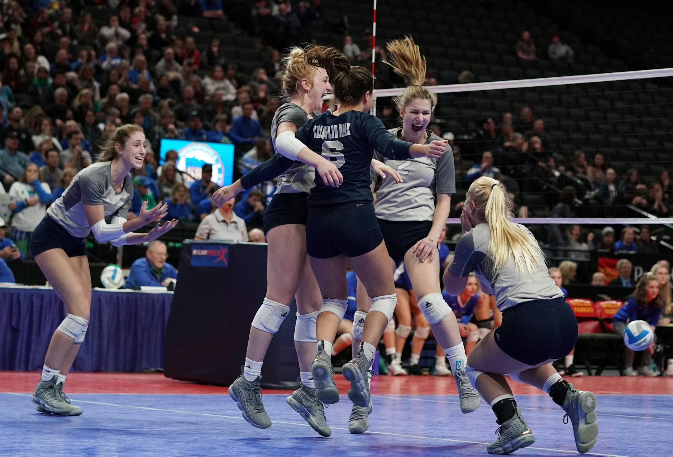 Champlin Park players celebrated after defeating Eagan in five sets. ] ANTHONY SOUFFLE ï anthony.souffle@startribune.com Champlin Park High School played Eagan High School in a Class 3A state volleyball championship game Saturday, Nov. 10. 2018 at the Xcel Energy Center in St. Paul, Minn.