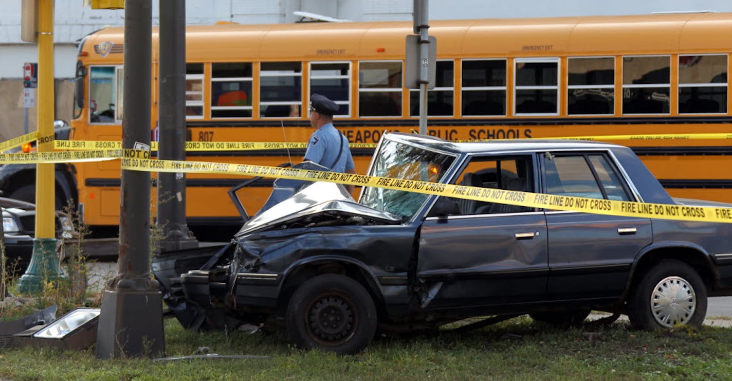 One person in this car died after it collided with the school bus and a utility pole.