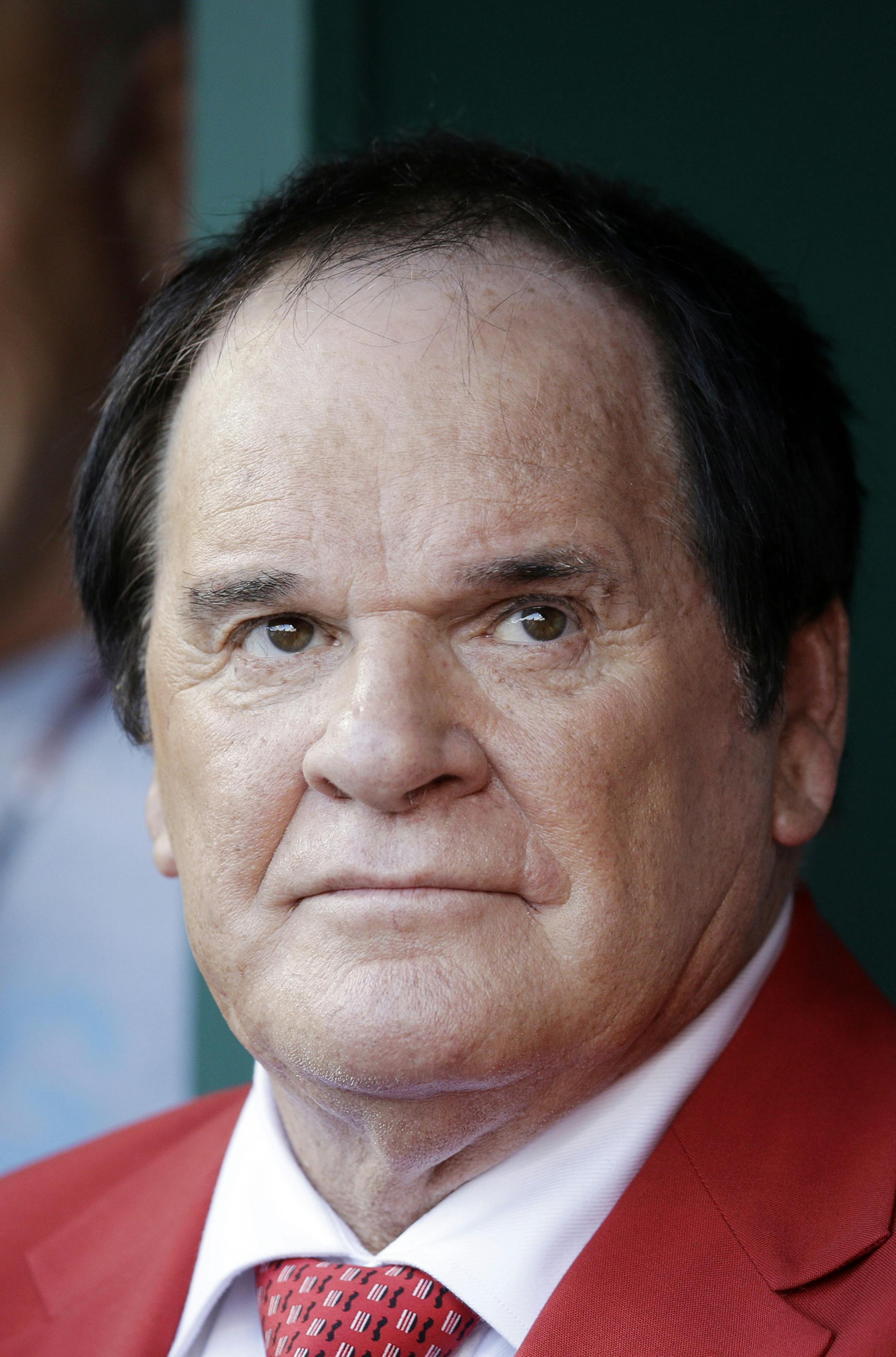 Former Cincinnati Reds' Pete Rose waits before being introduced as one of the team's Franchise Four before the MLB All-Star baseball game, Tuesday, July 14, 2015, in Cincinnati. (AP Photo/John Minchillo)